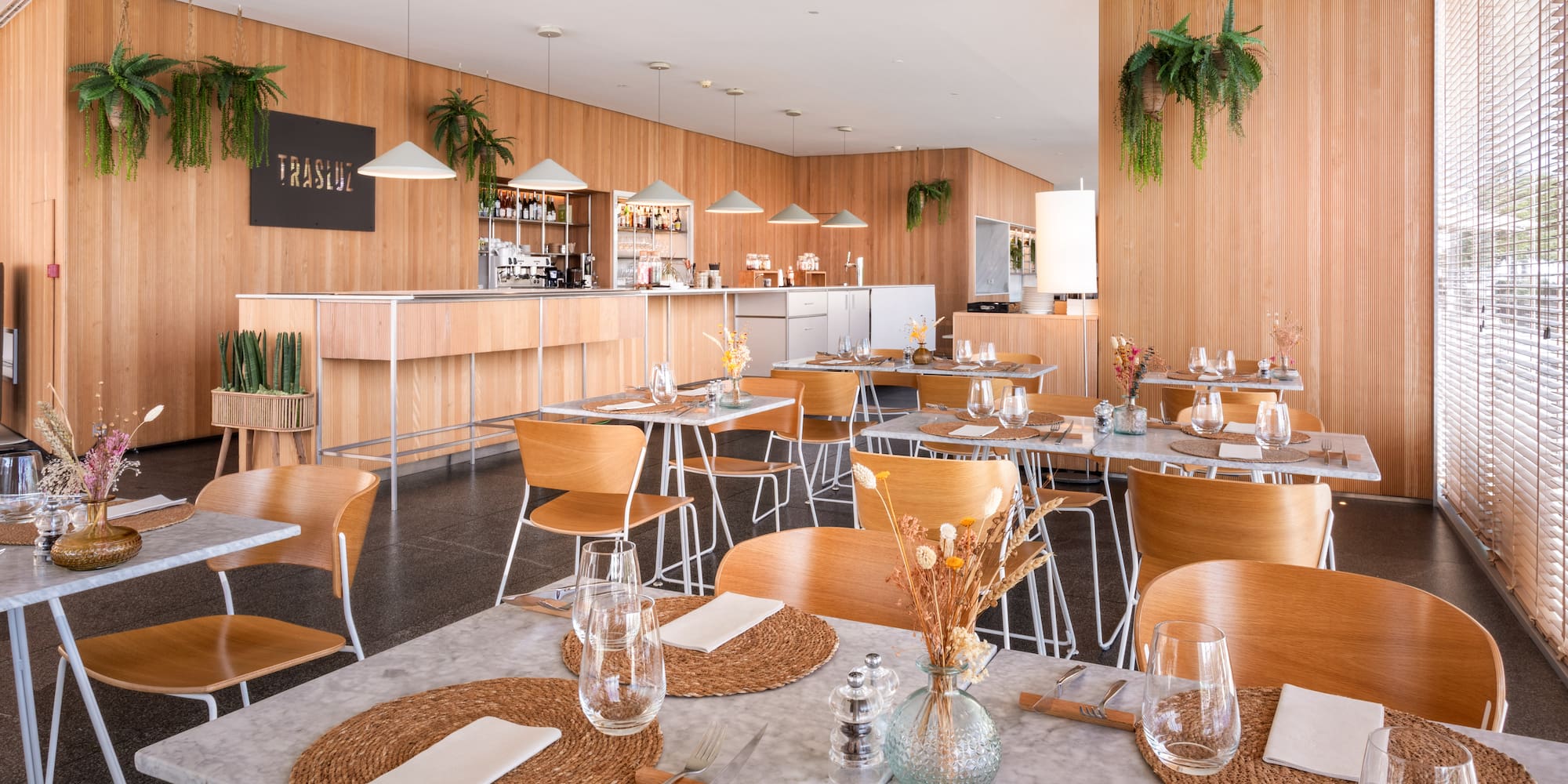 a restaurant with tables and chairs