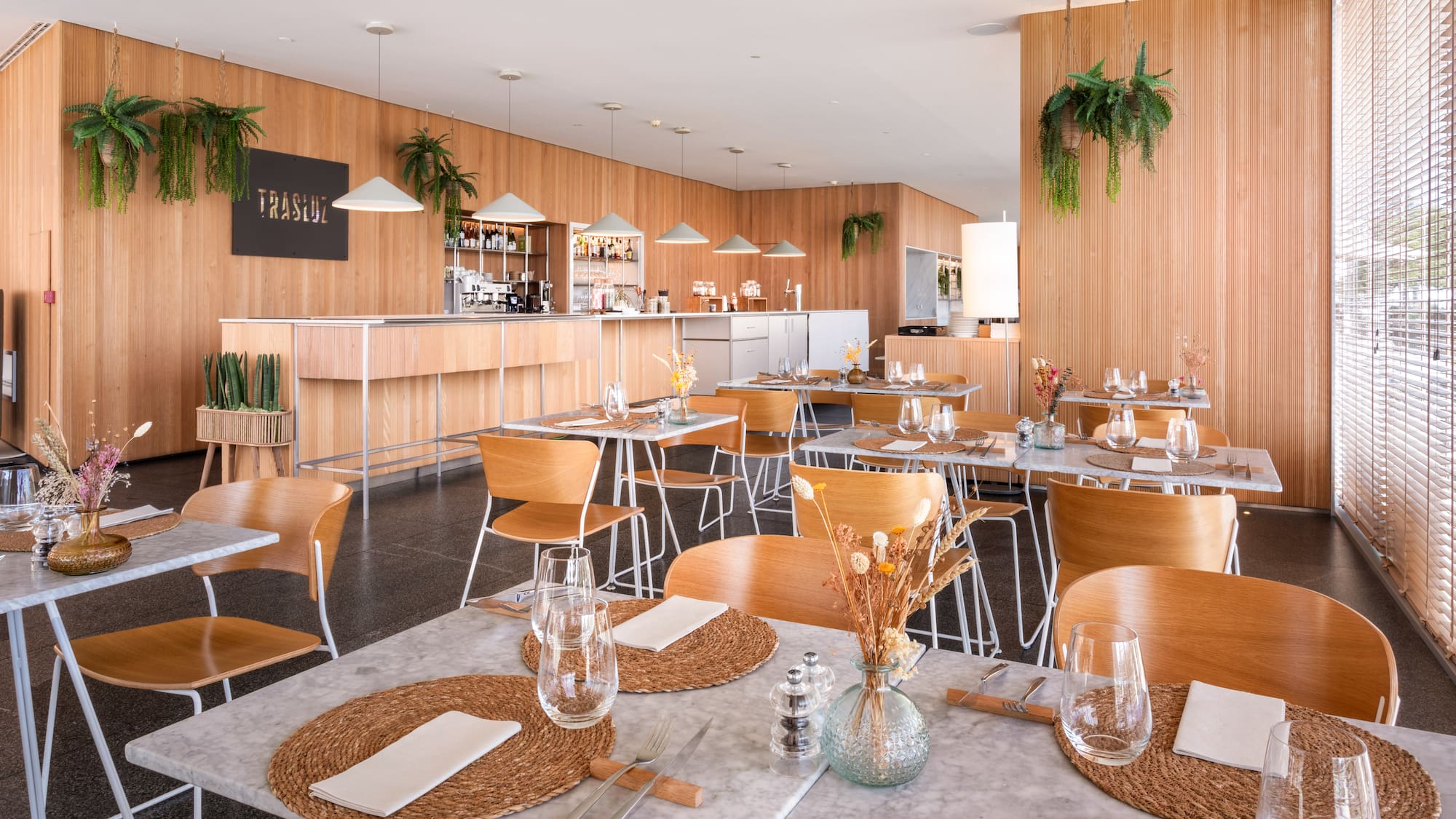 a restaurant with tables and chairs