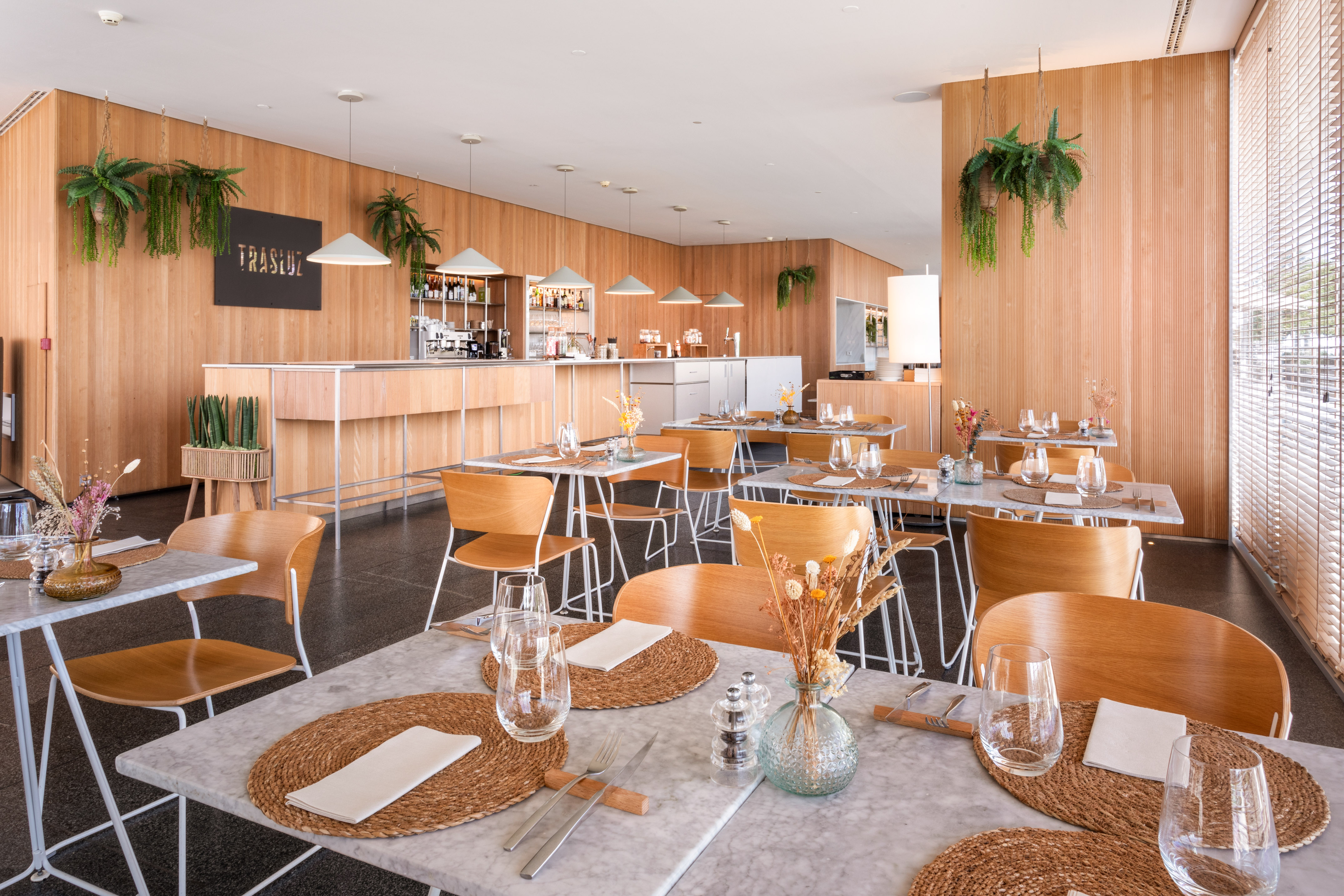 a restaurant with tables and chairs