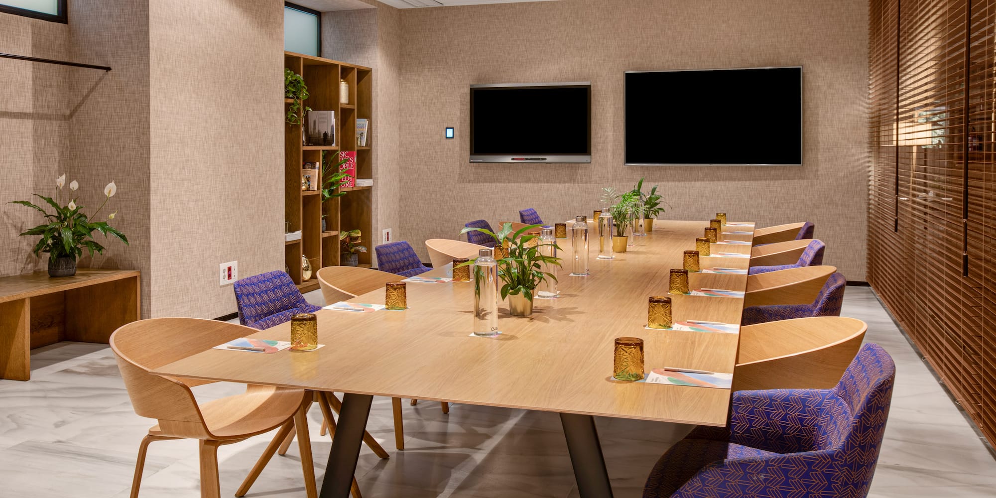 a room with a table and chairs