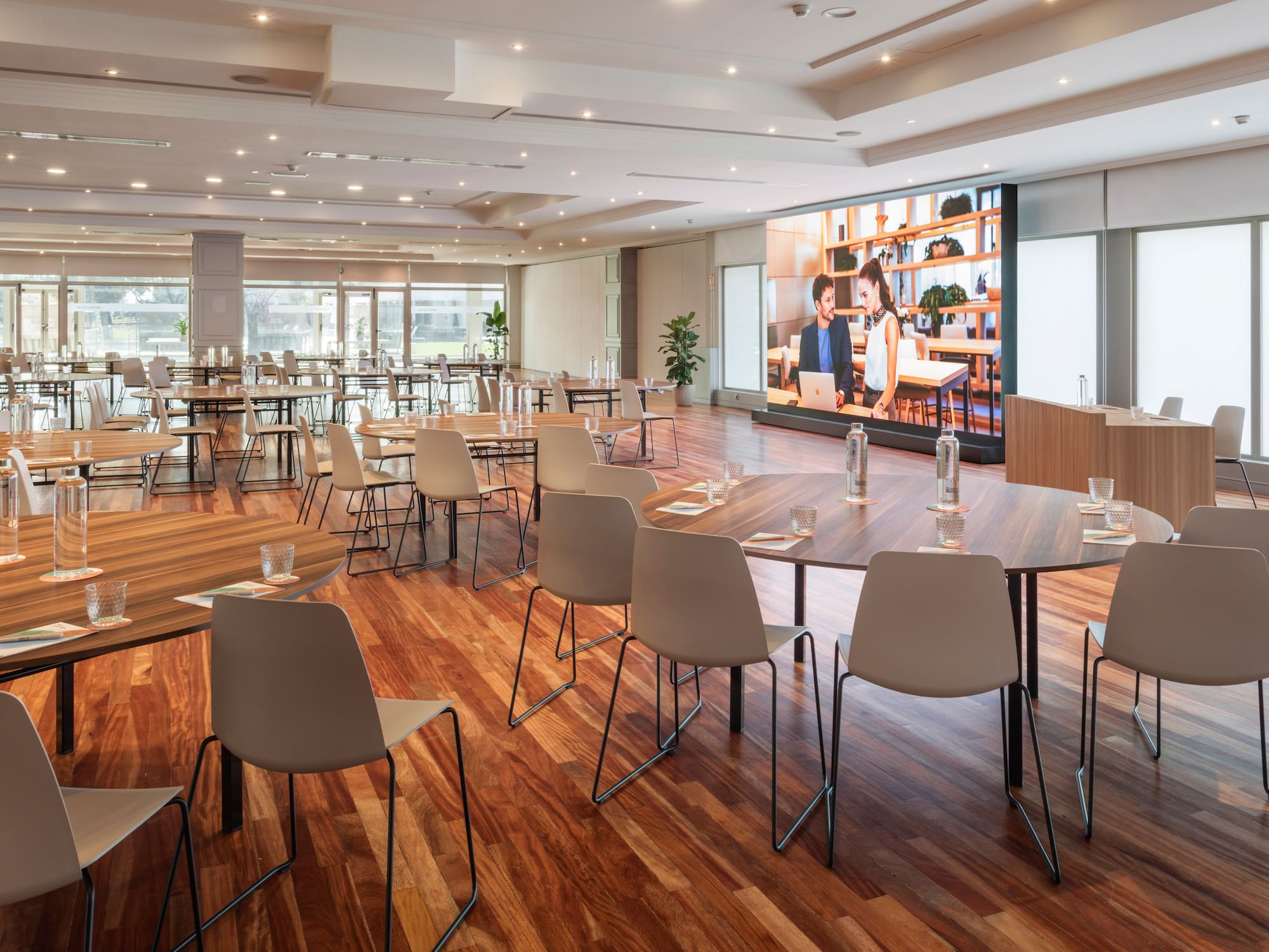 a room with tables and chairs