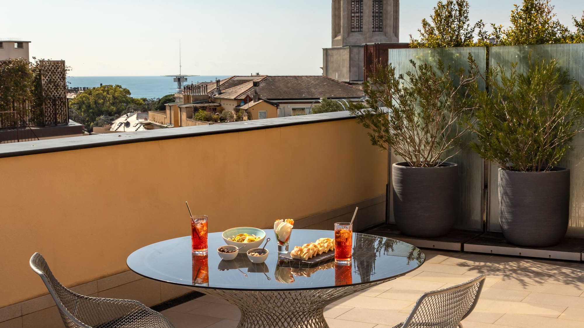 a table and chairs on a rooftop