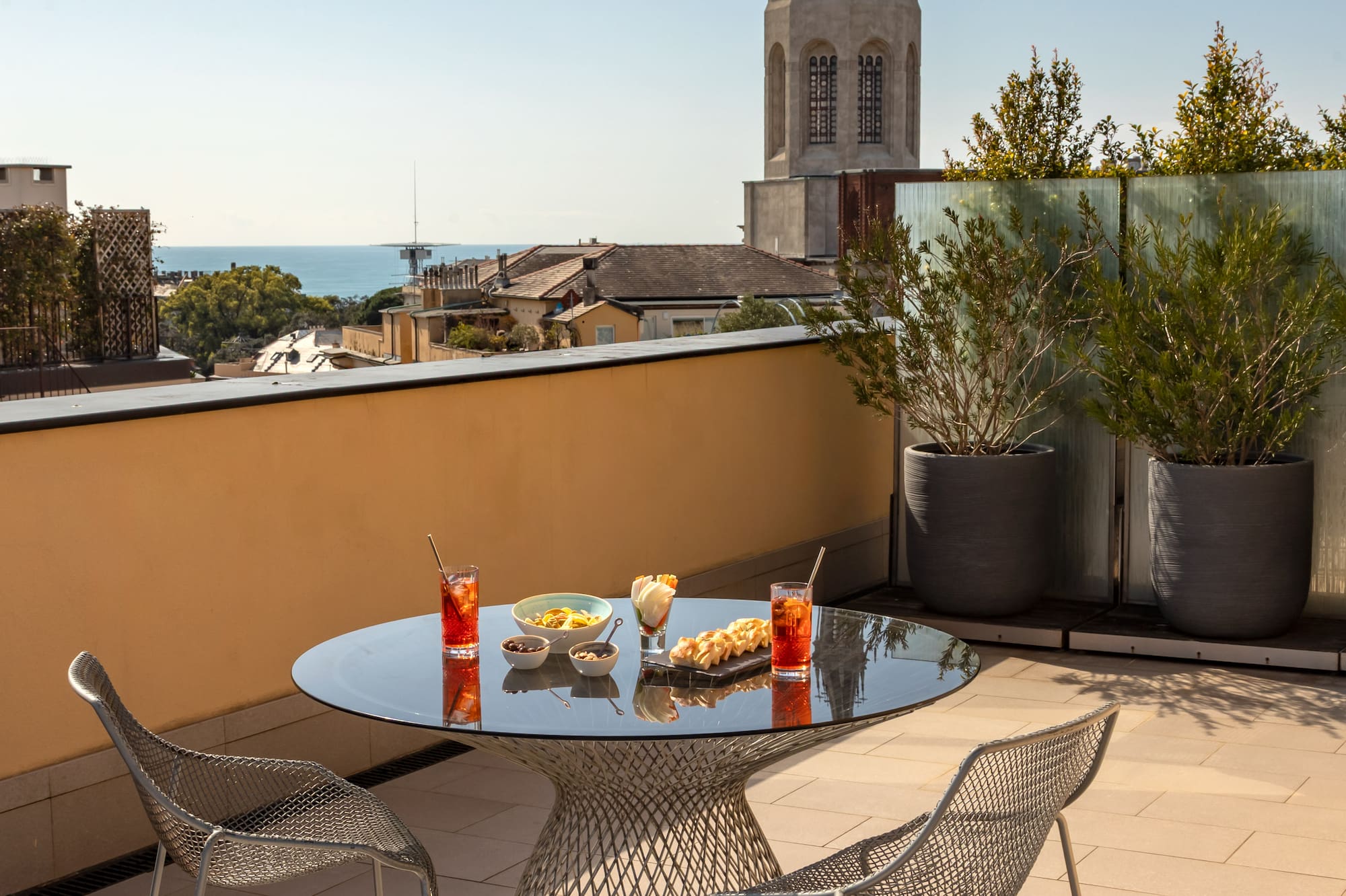 a table and chairs on a rooftop