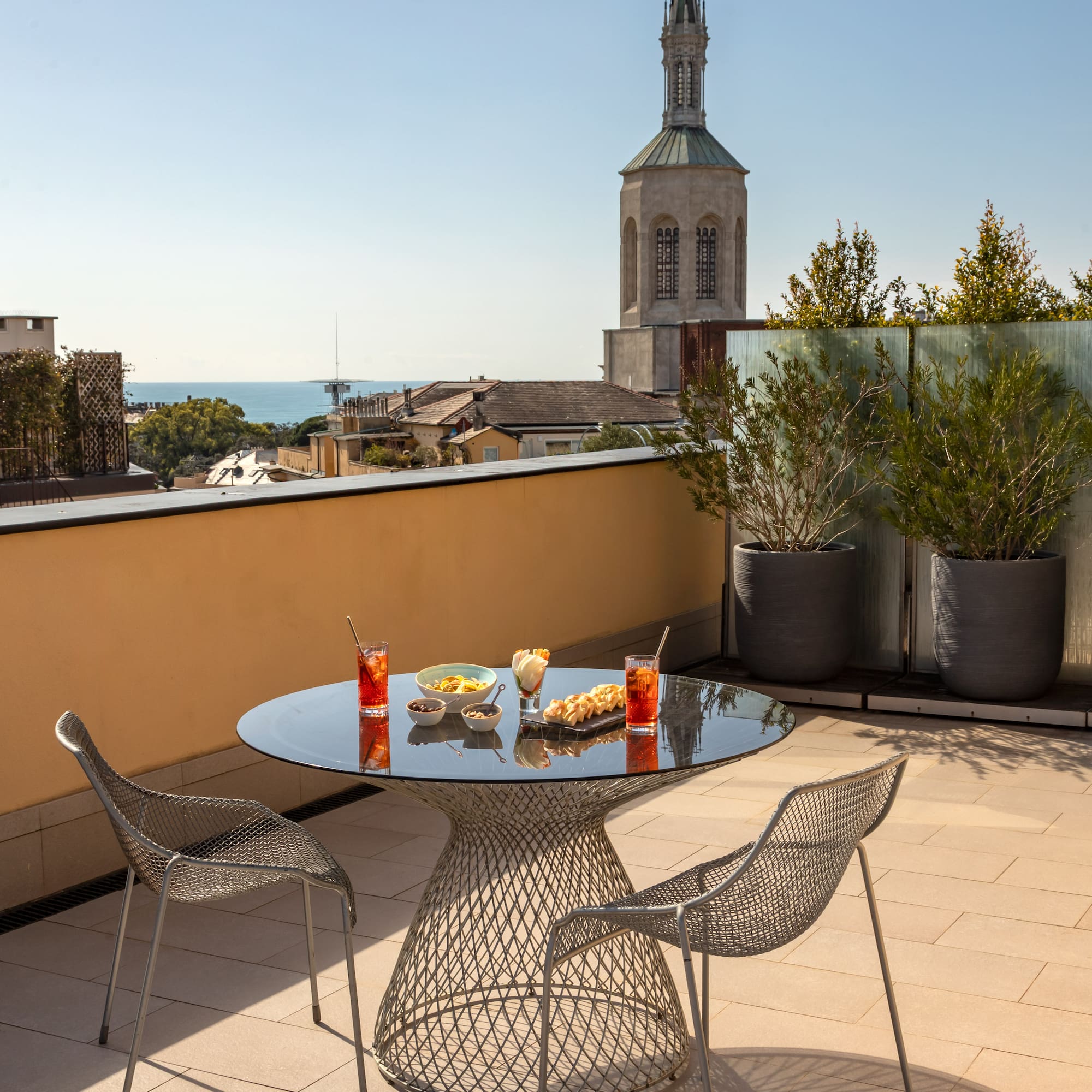 a table and chairs on a rooftop