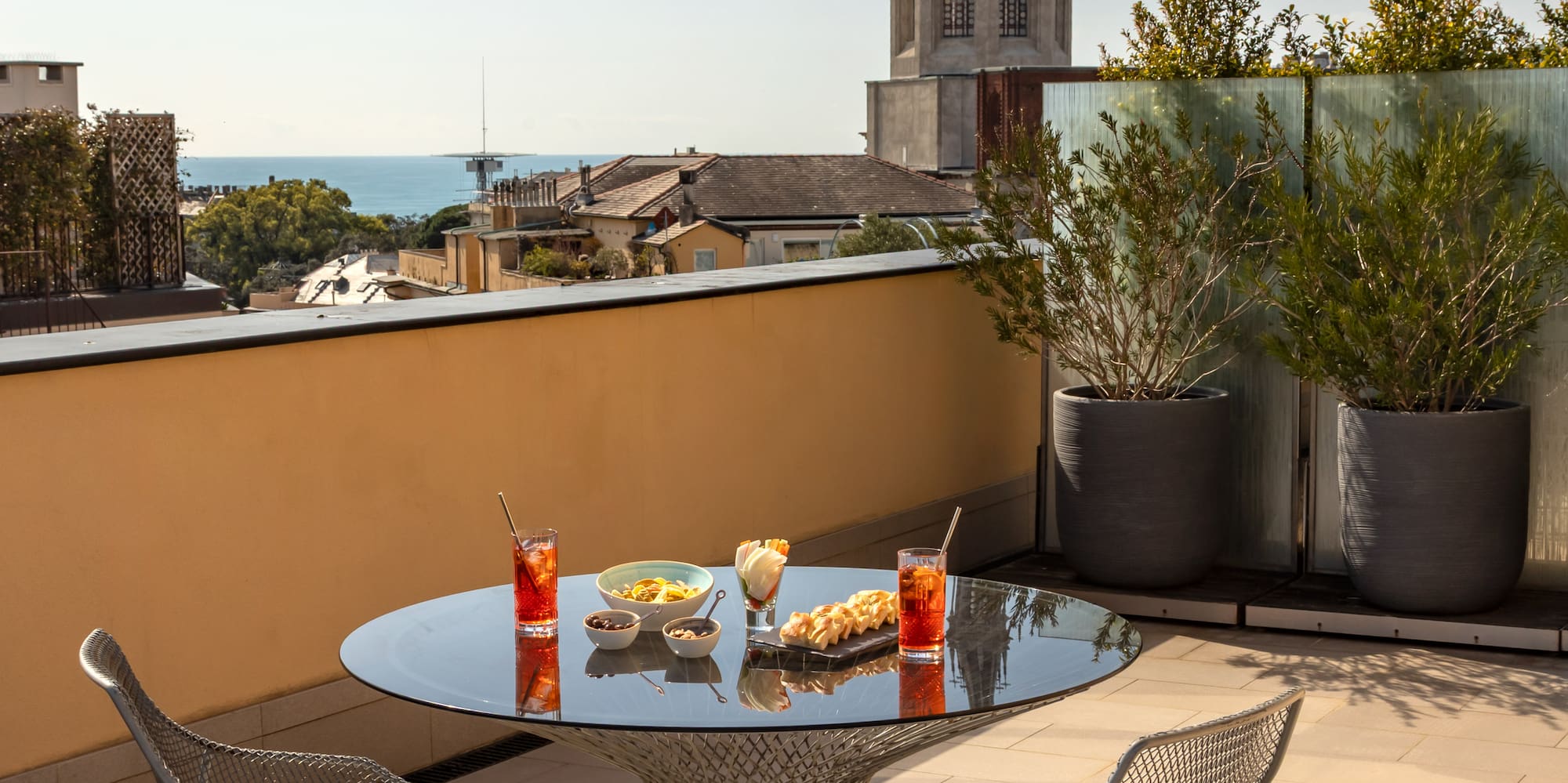a table and chairs on a rooftop