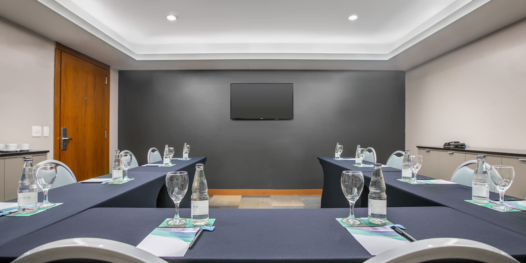 a room with tables and chairs