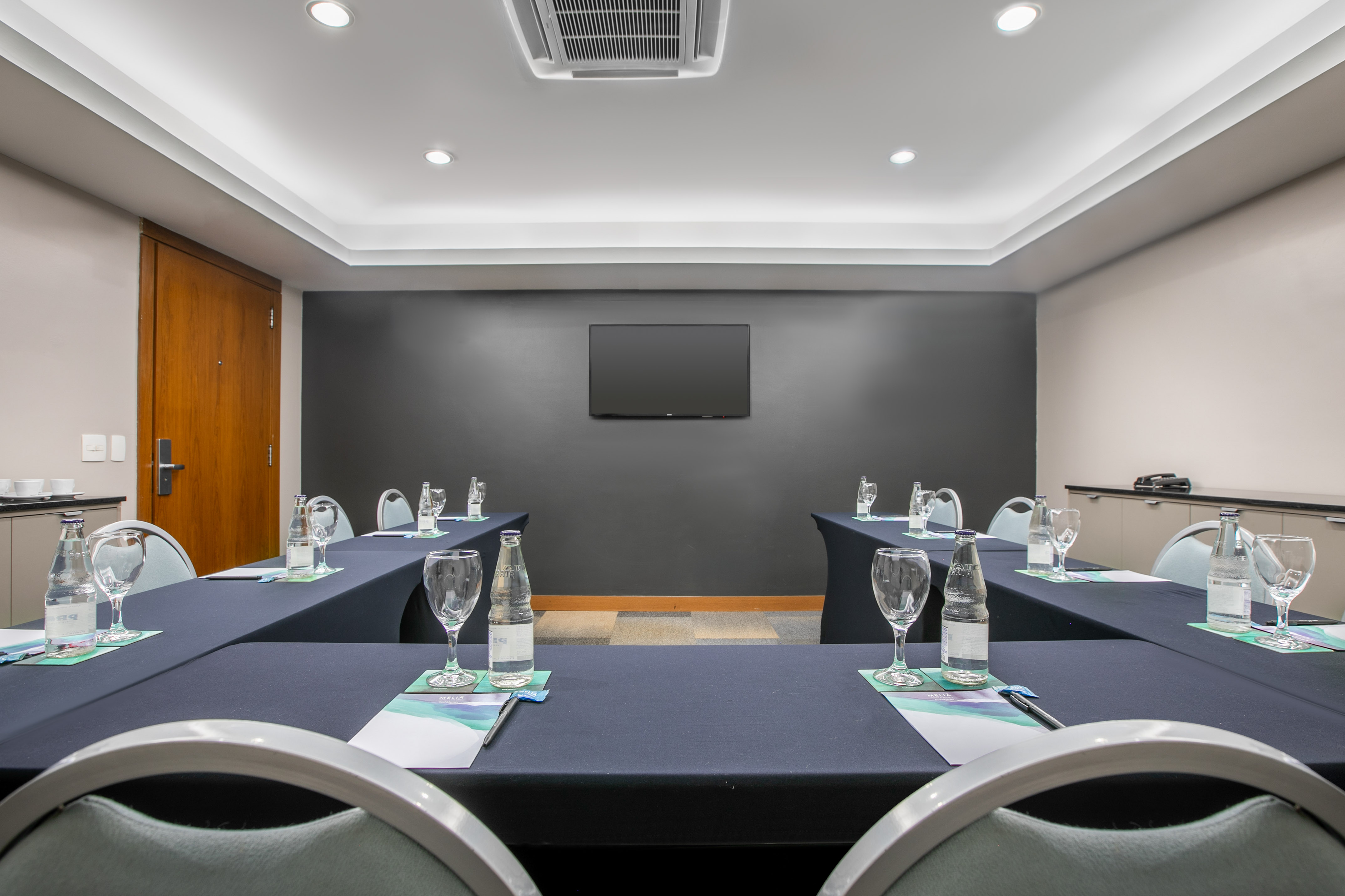 a room with tables and chairs