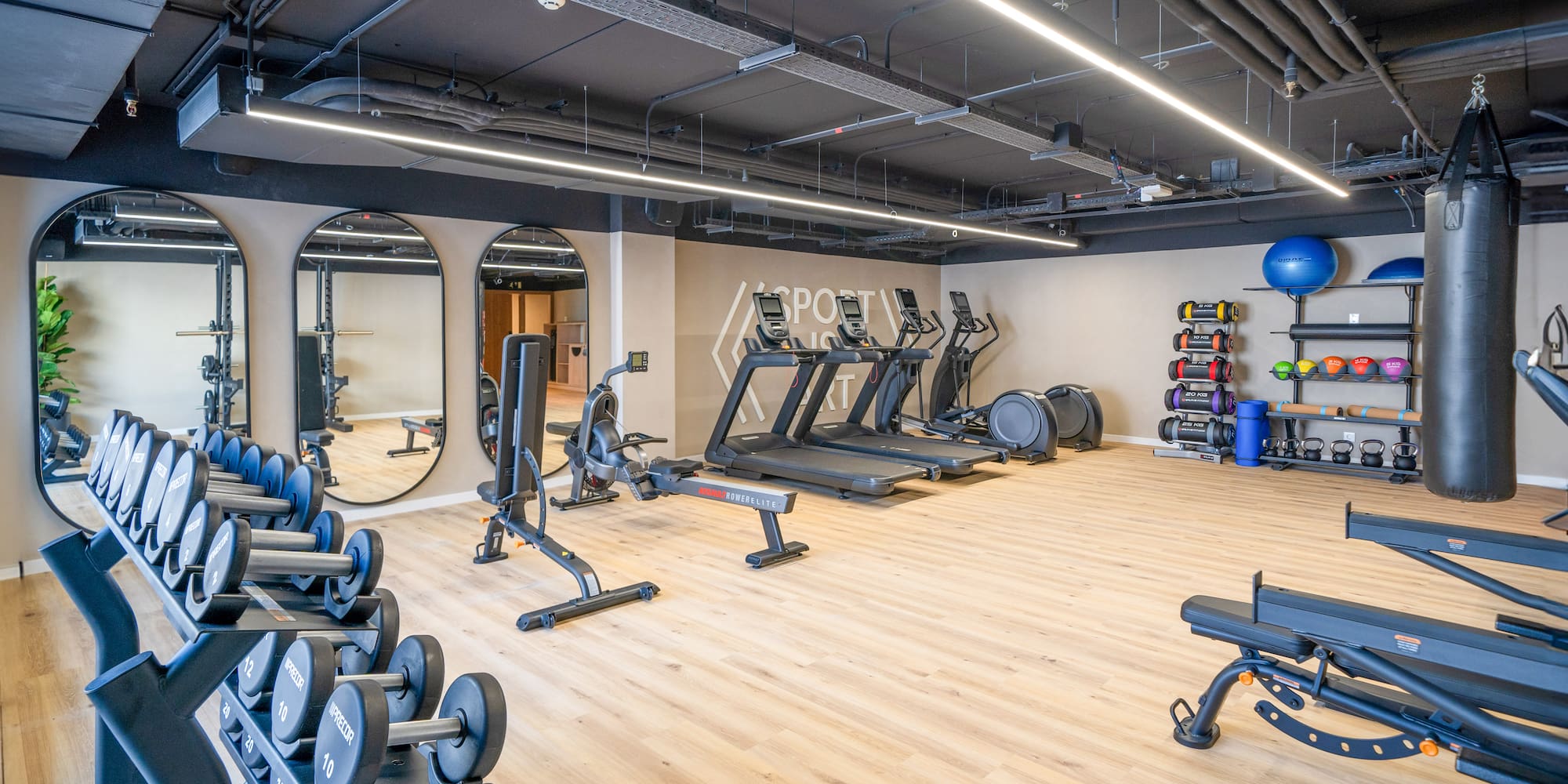 a large gym with exercise equipment