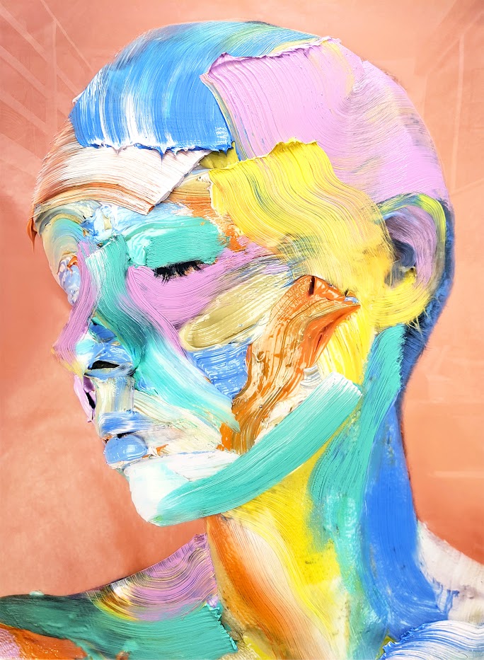 a woman with colorful paint on her face