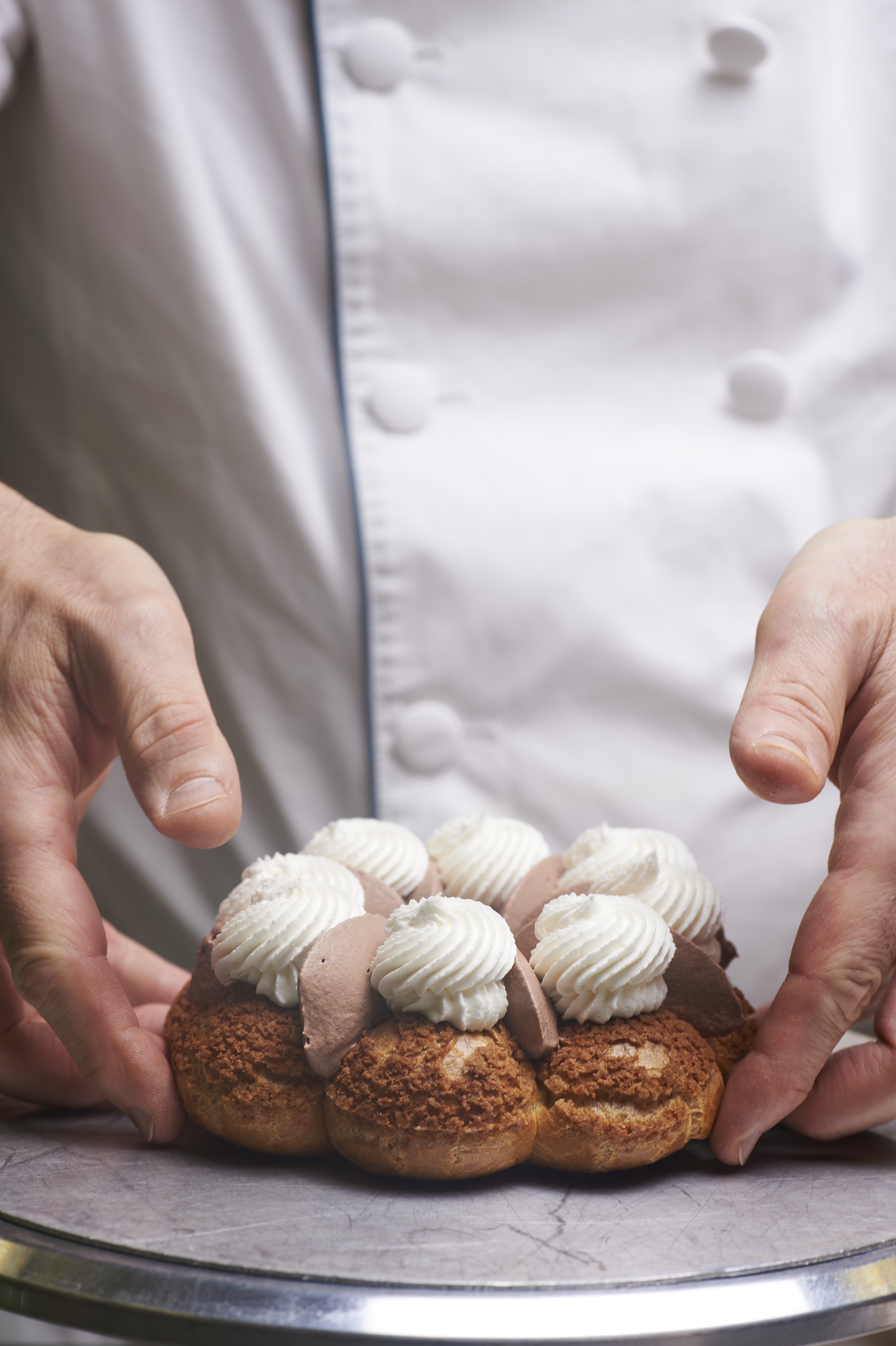 a person holding a pastry