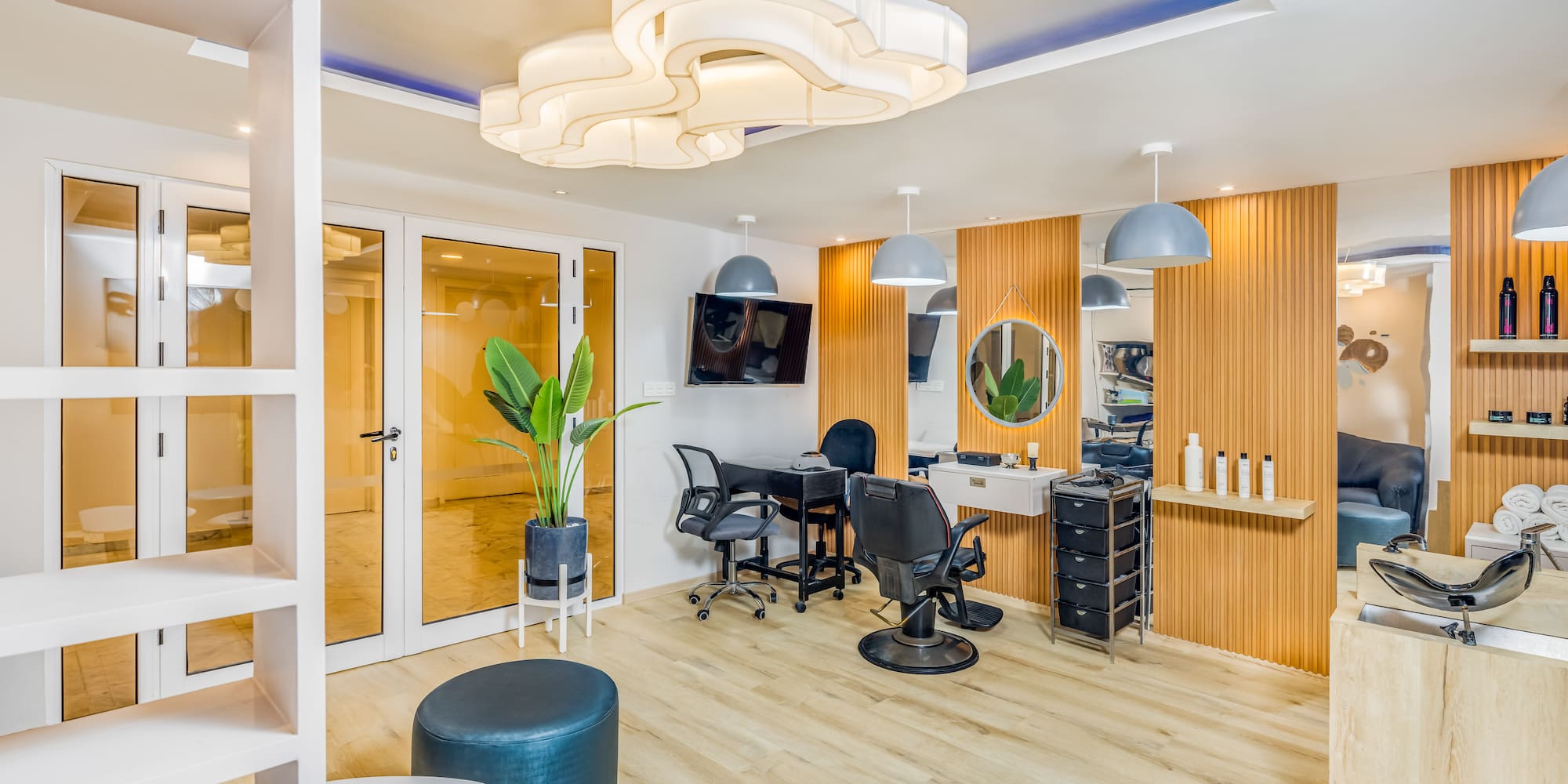 a room with chairs and a mirror