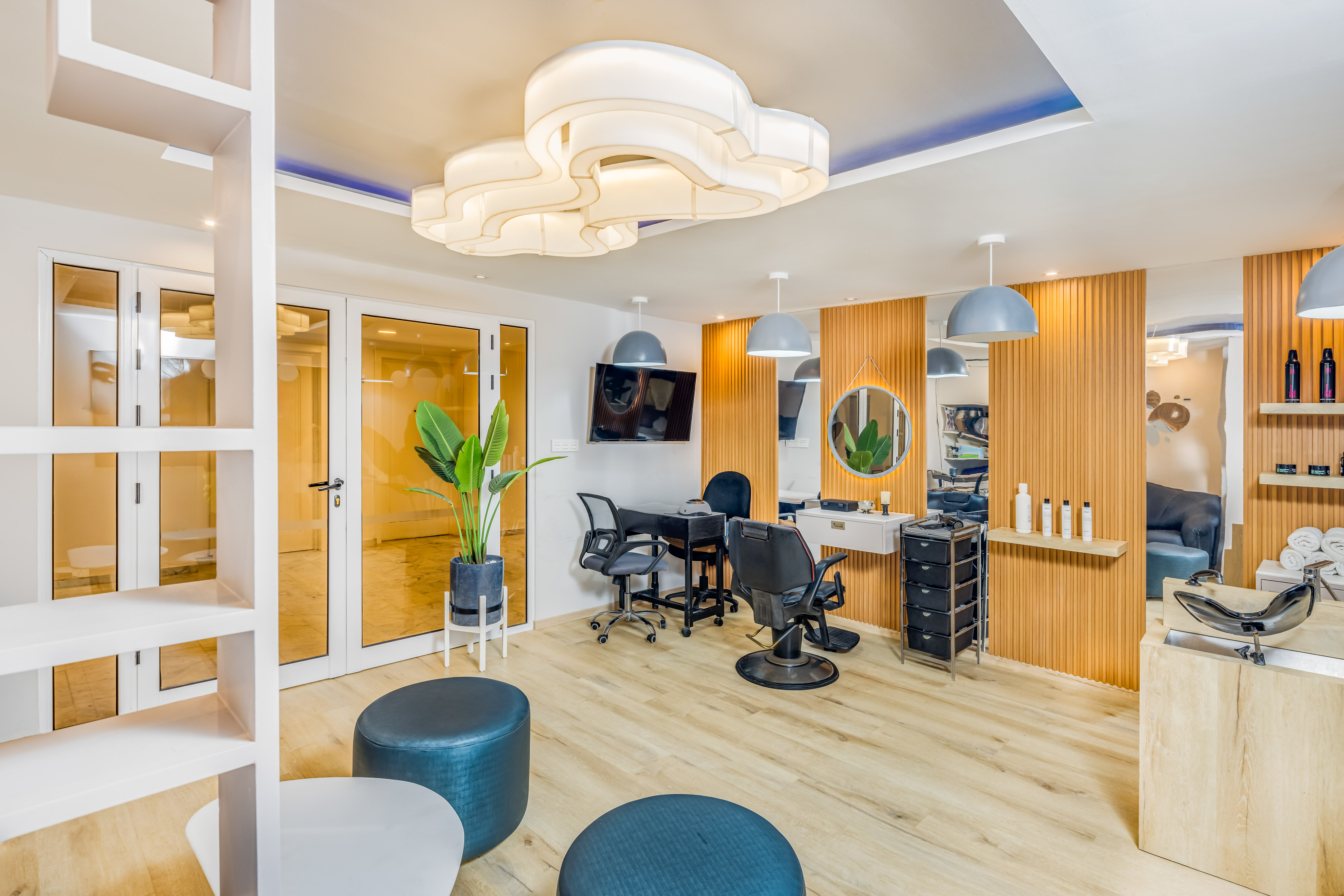 a room with chairs and a mirror