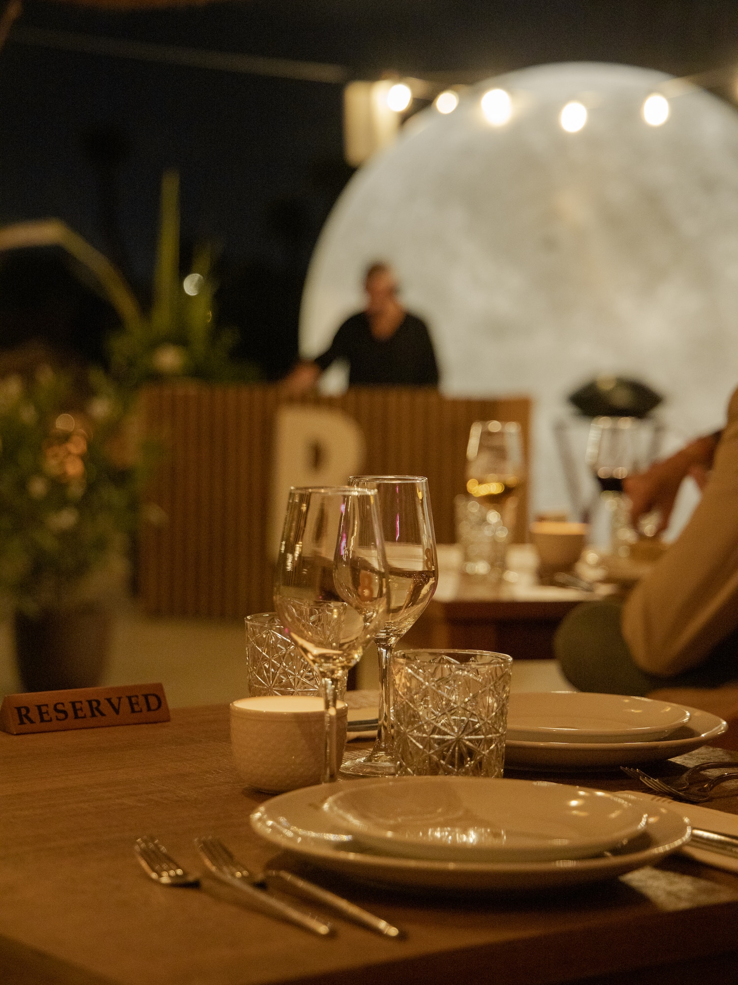 a table with plates and glasses