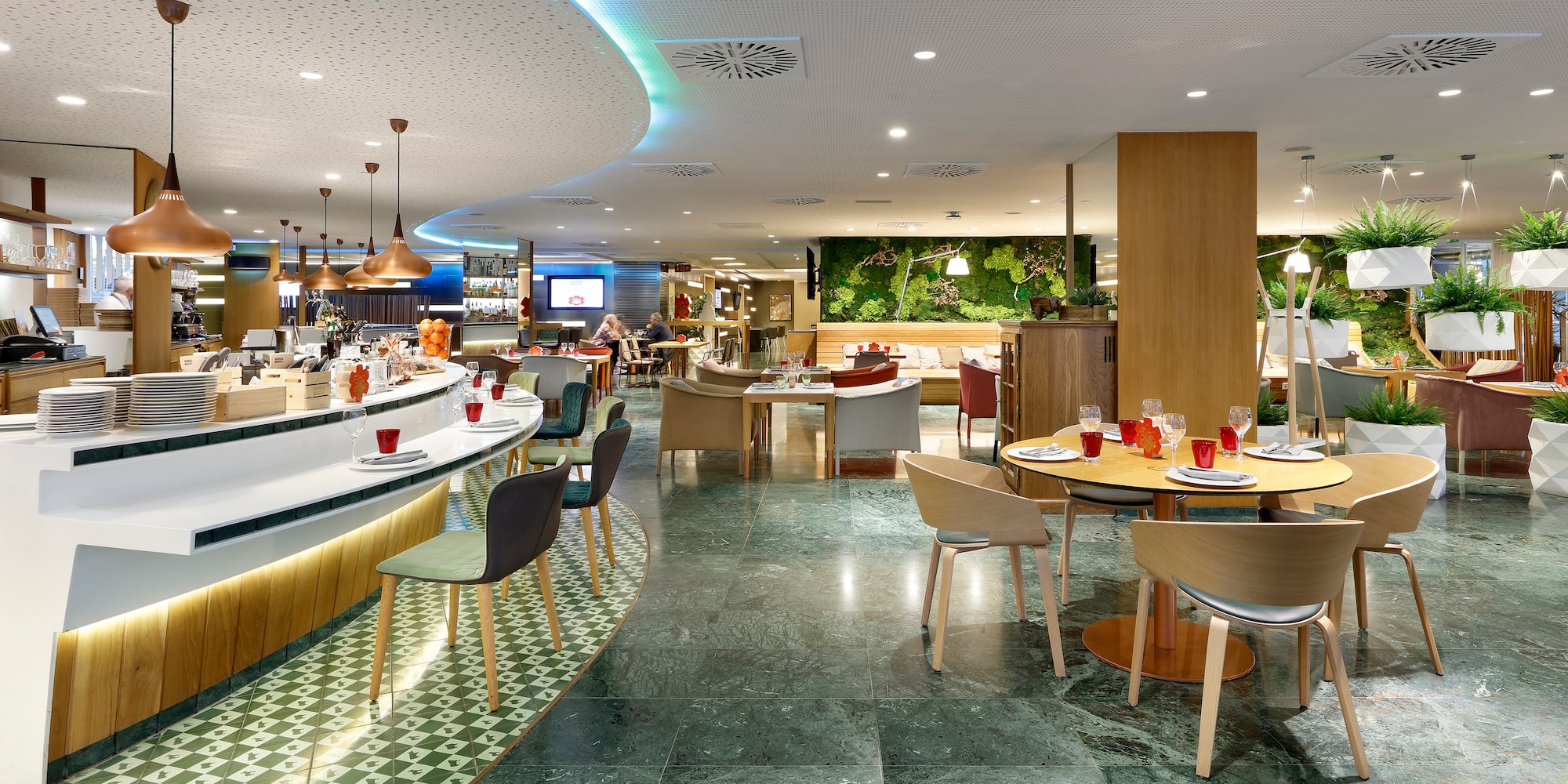 a restaurant with tables and chairs