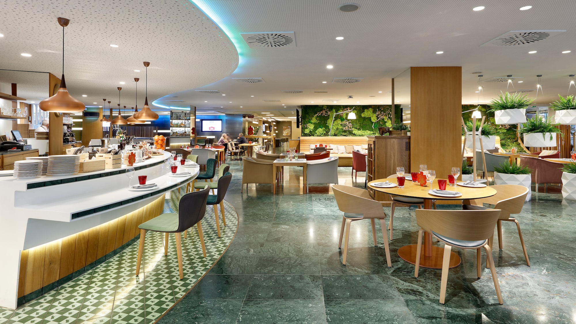 a restaurant with tables and chairs