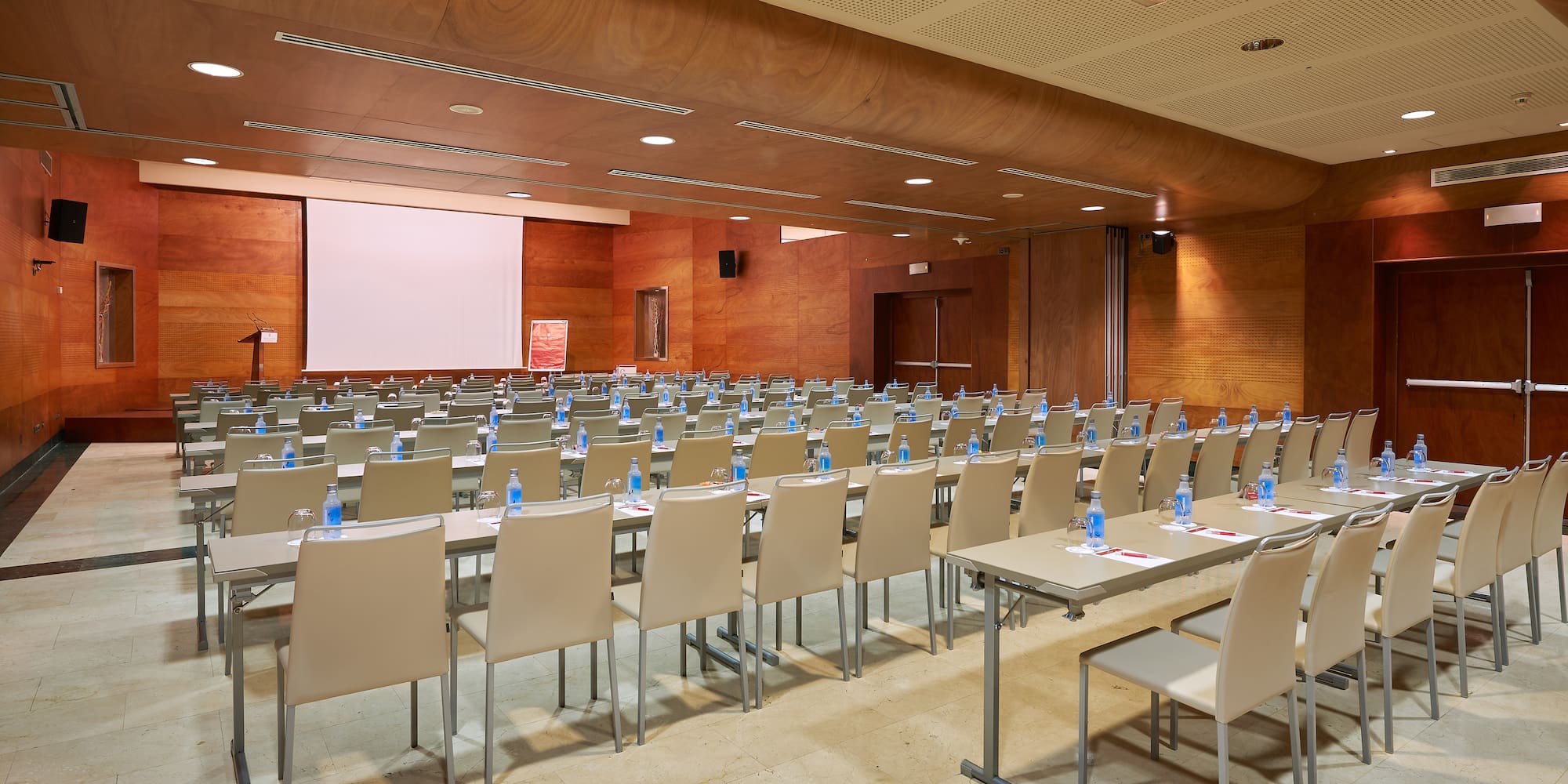 a room with tables and chairs