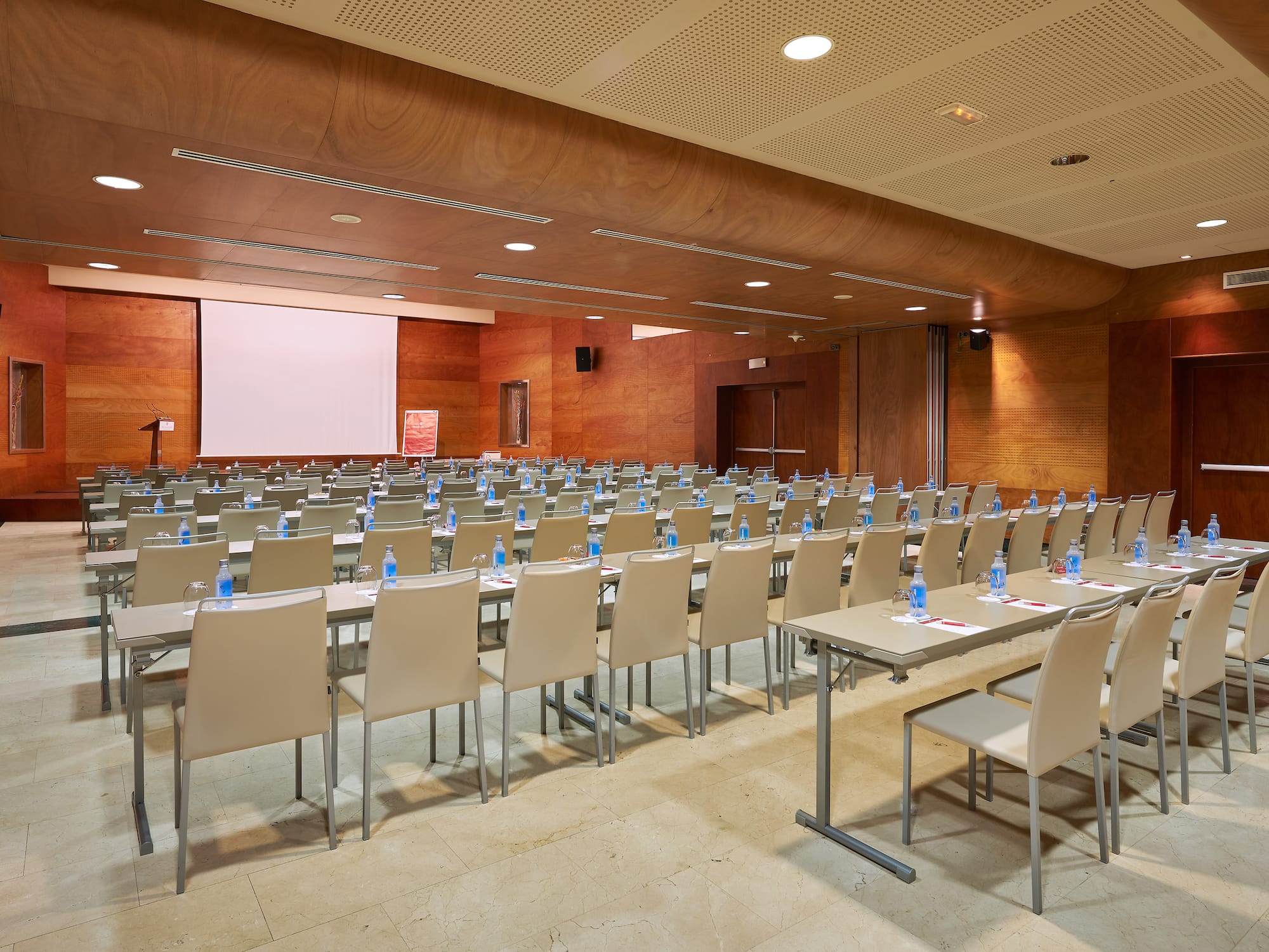 a room with tables and chairs