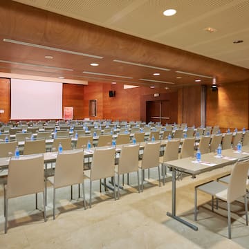 a room with tables and chairs