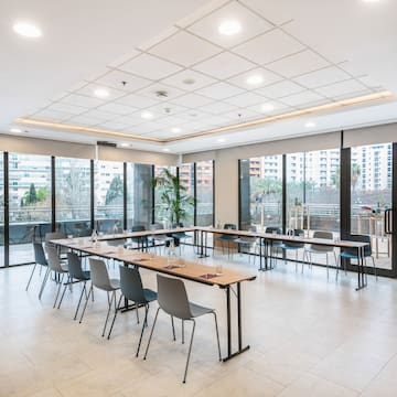 a room with tables and chairs