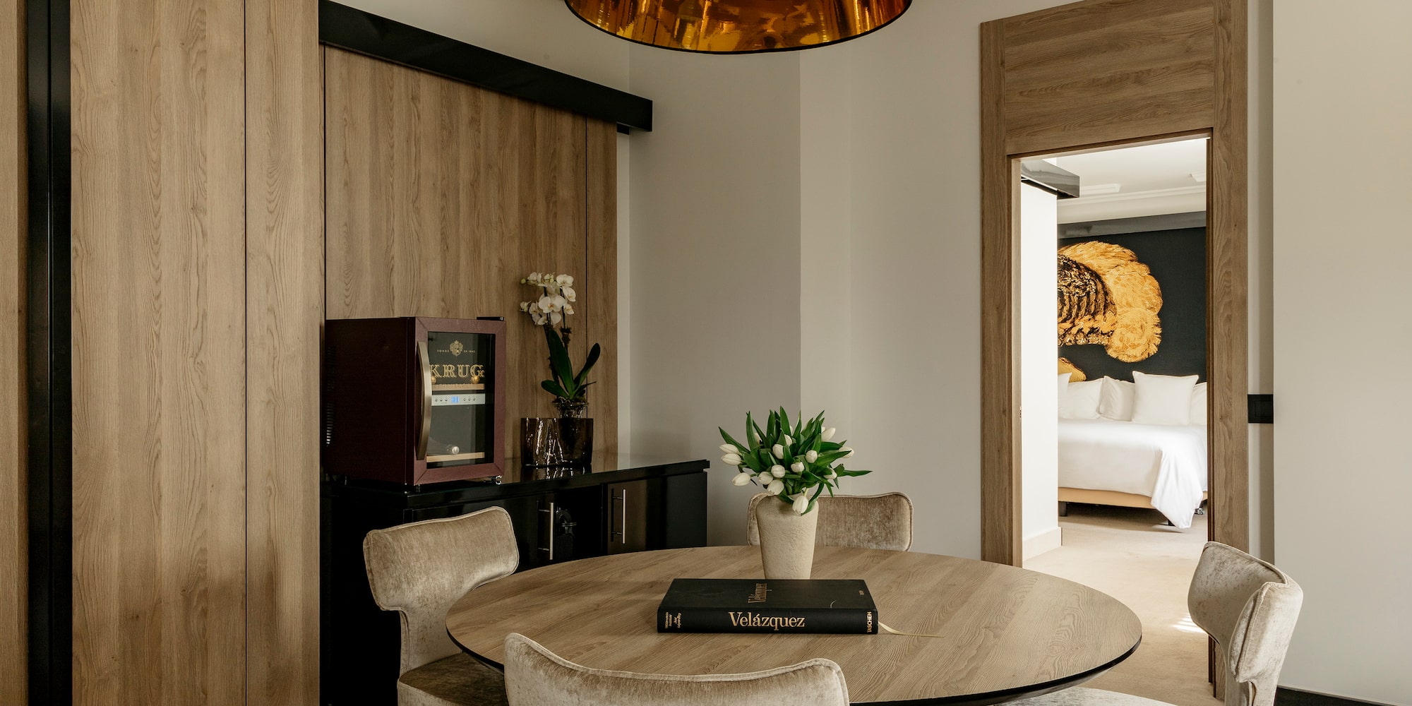 a room with a table and chairs