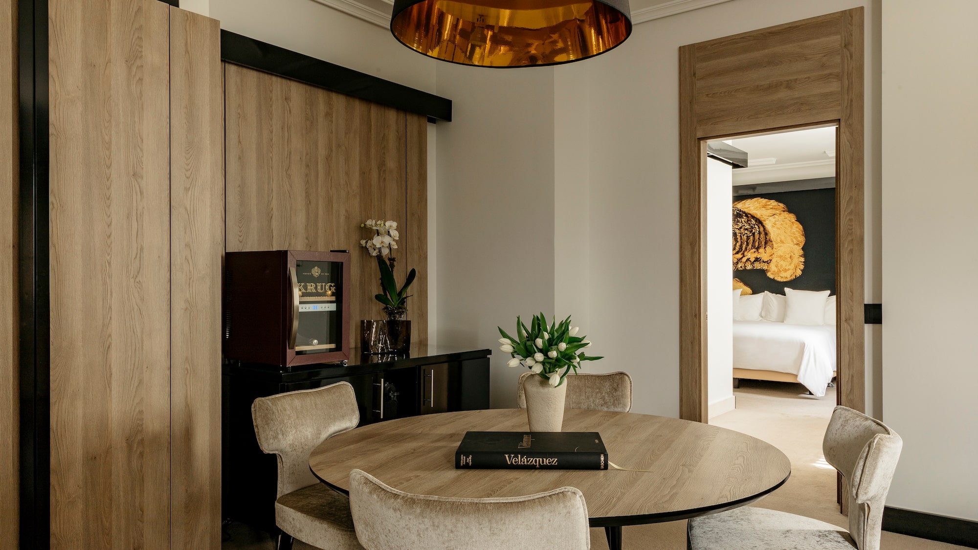 a room with a table and chairs