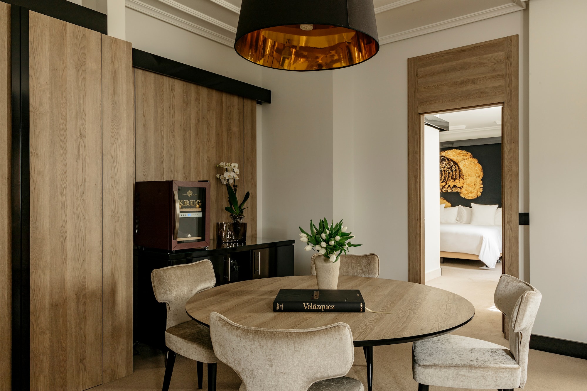 a room with a table and chairs