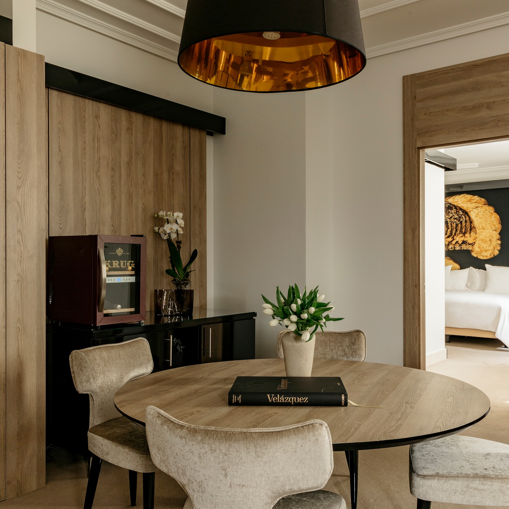 a room with a table and chairs