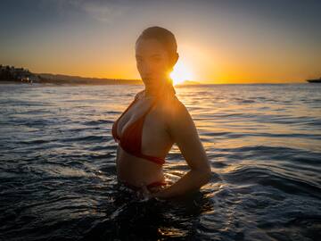 a woman in a garment in the water