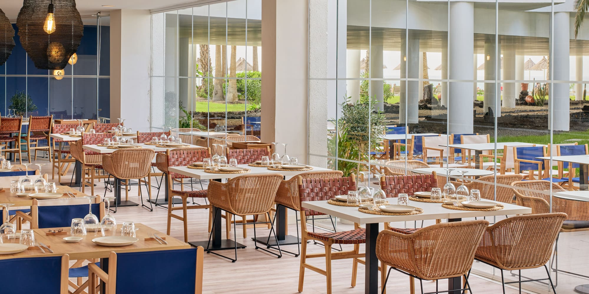 a restaurant with tables and chairs