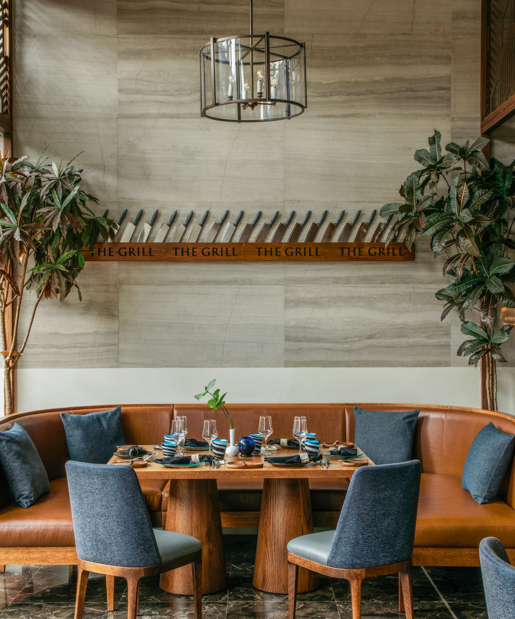 a table with a set of plates and glasses on it