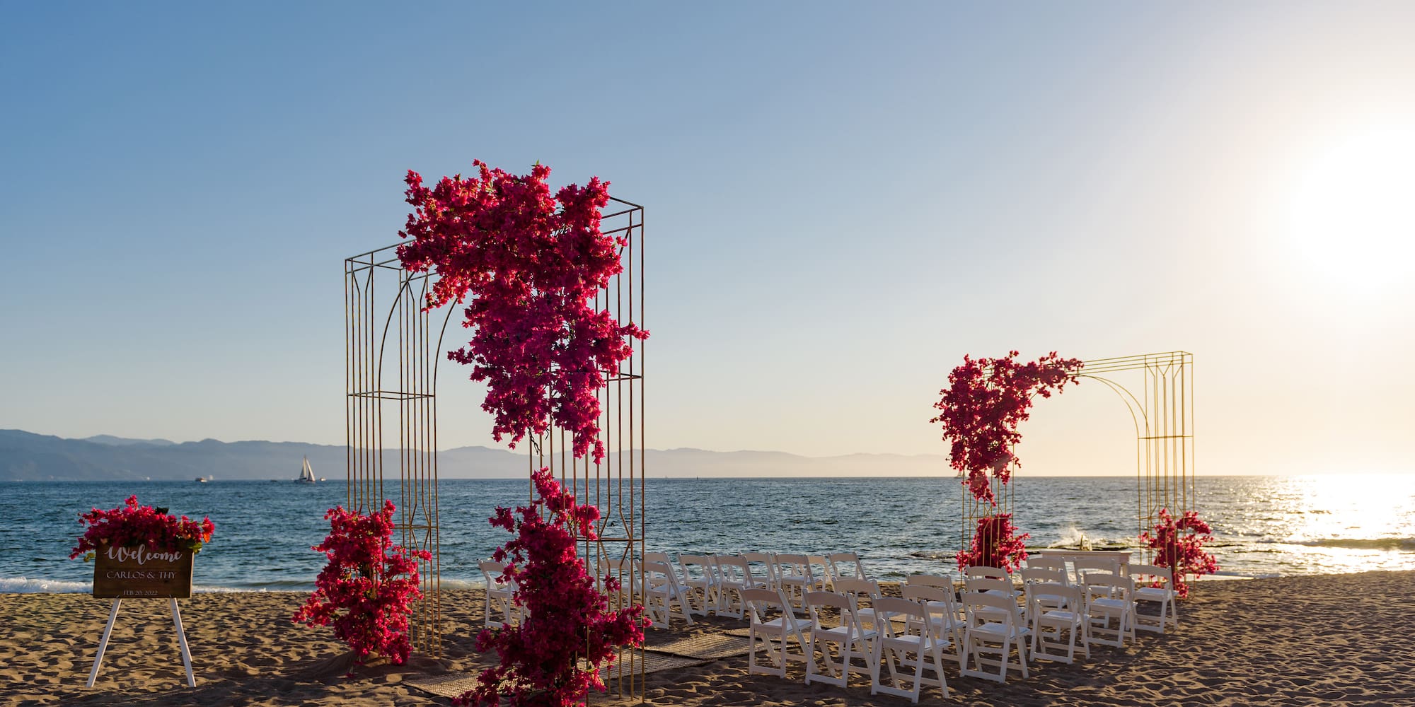 a wedding ceremony set up on a beach