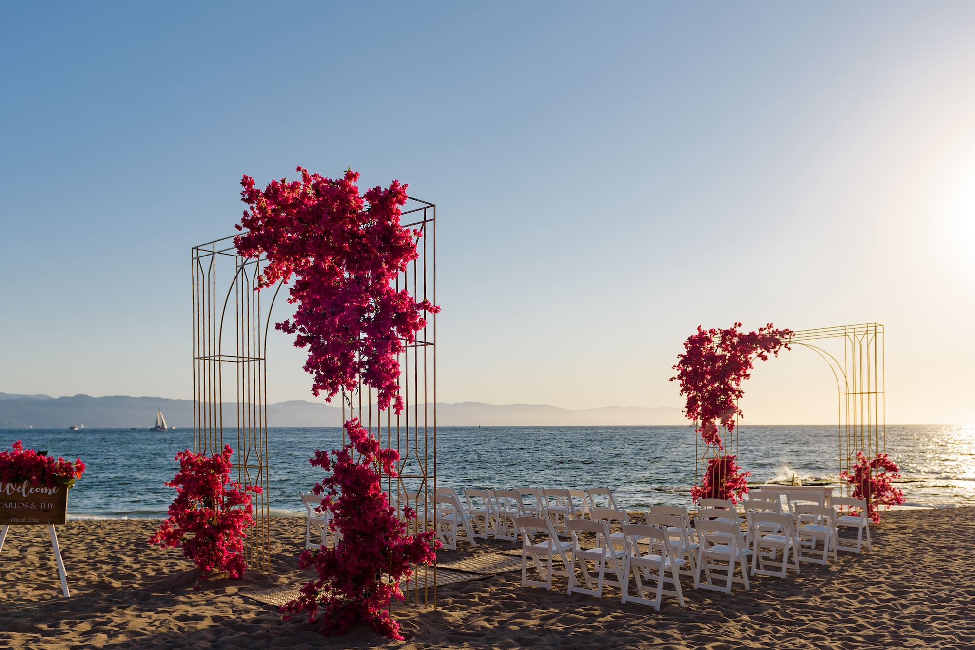 a wedding ceremony set up on a beach