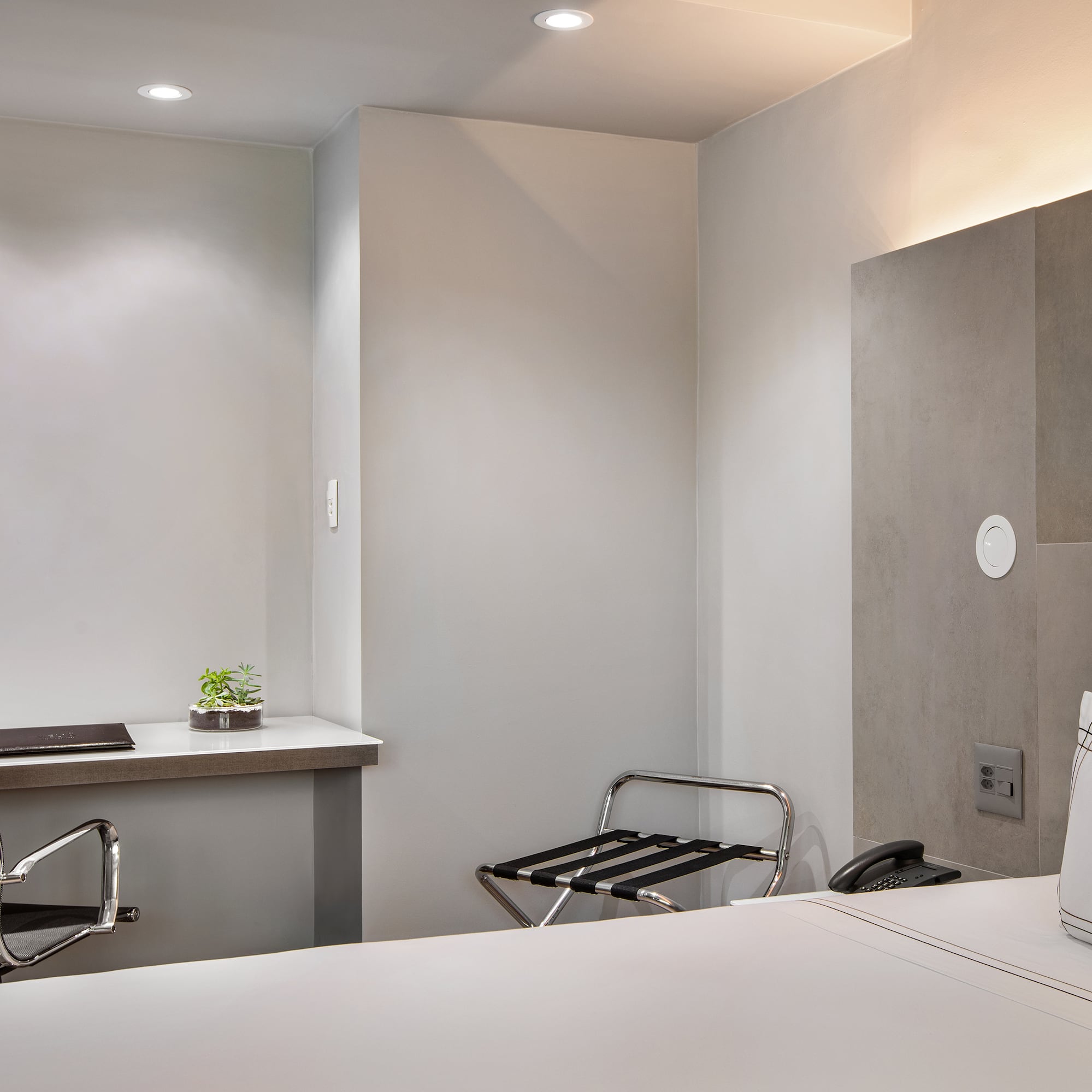 a room with a desk and chair