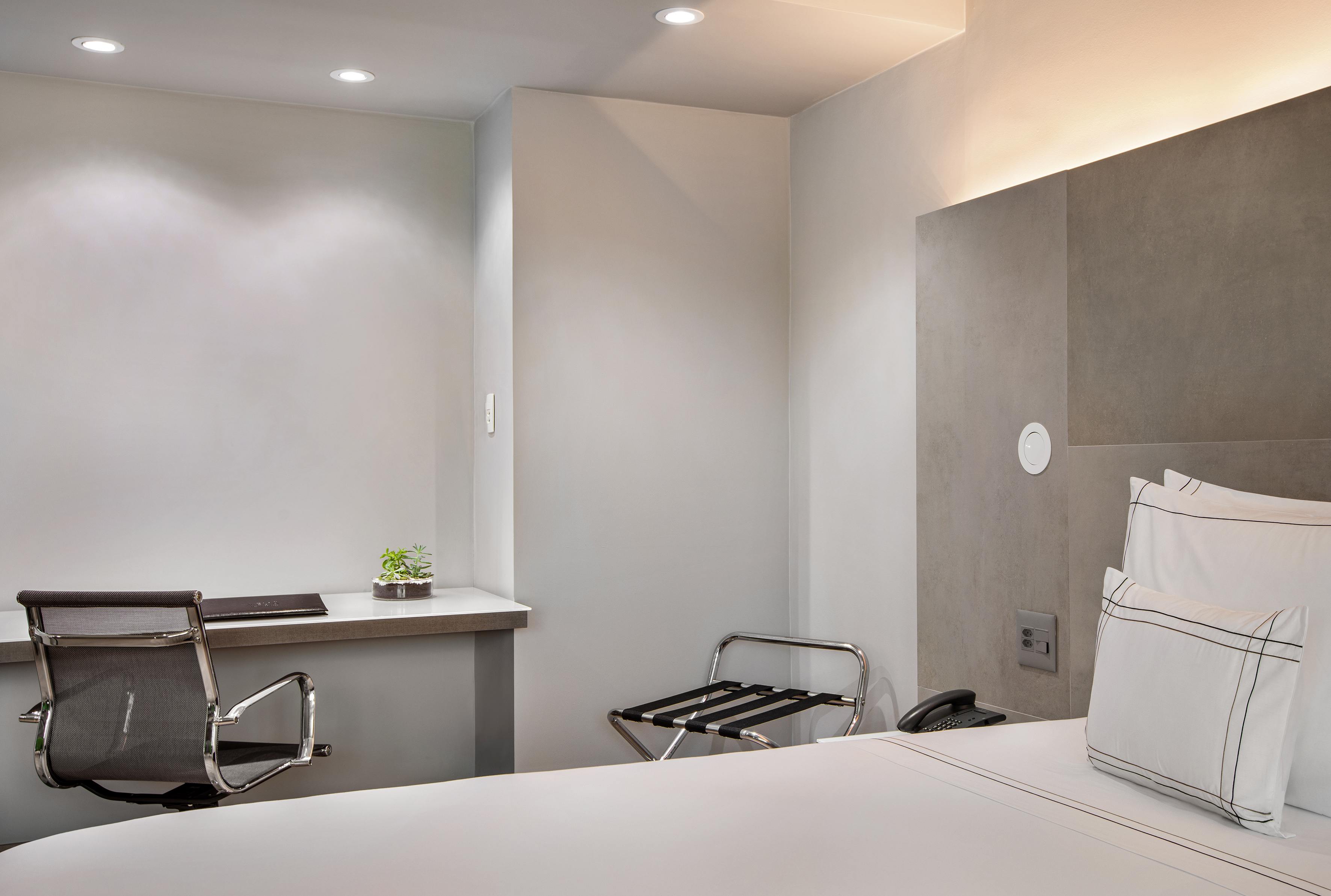 a room with a desk and chair