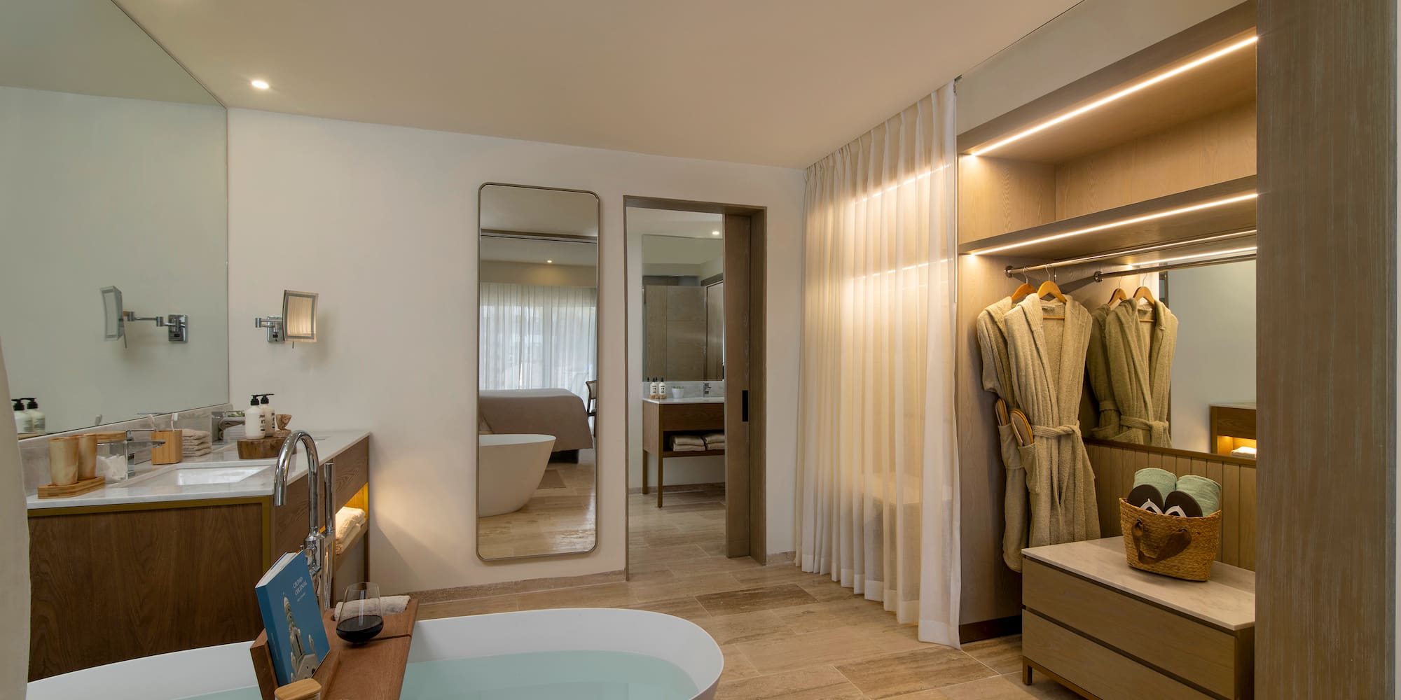 a bathroom with a bathtub and a mirror