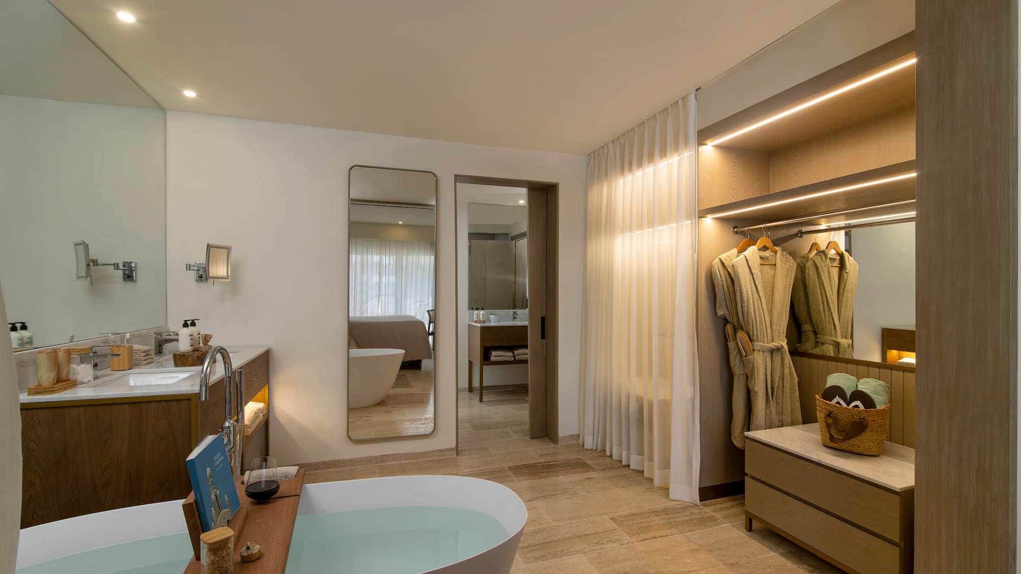 a bathroom with a bathtub and a mirror