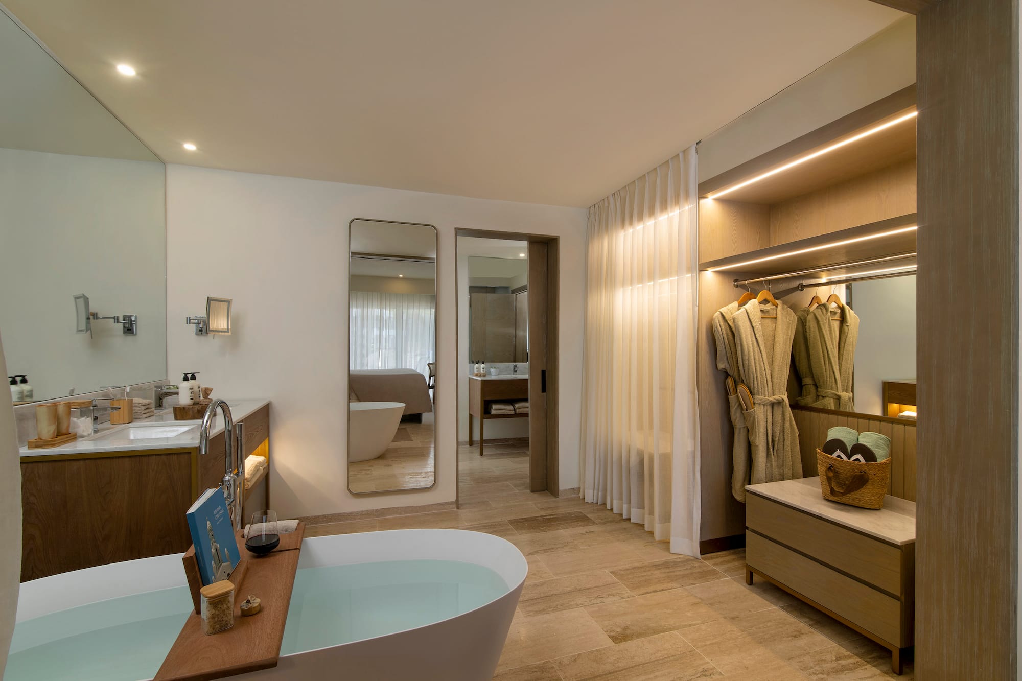 a bathroom with a bathtub and a mirror