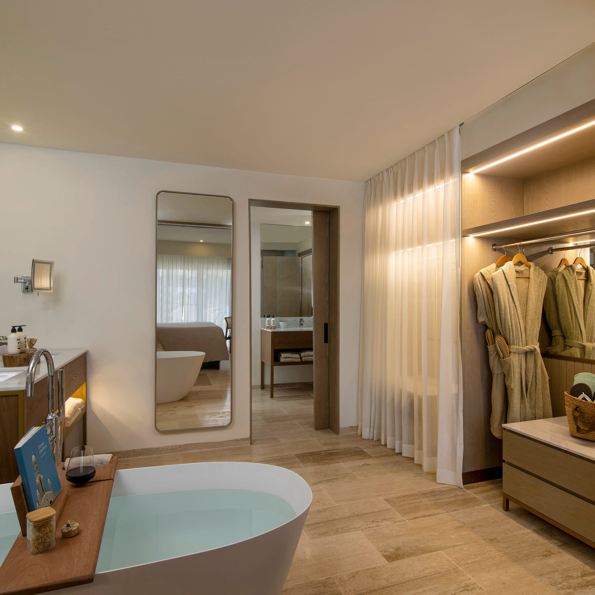 a bathroom with a bathtub and a mirror