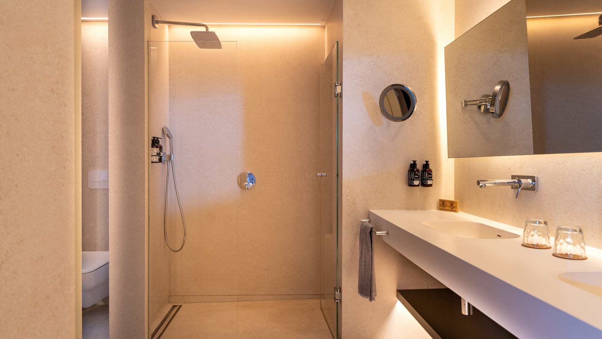 a bathroom with a shower and sink