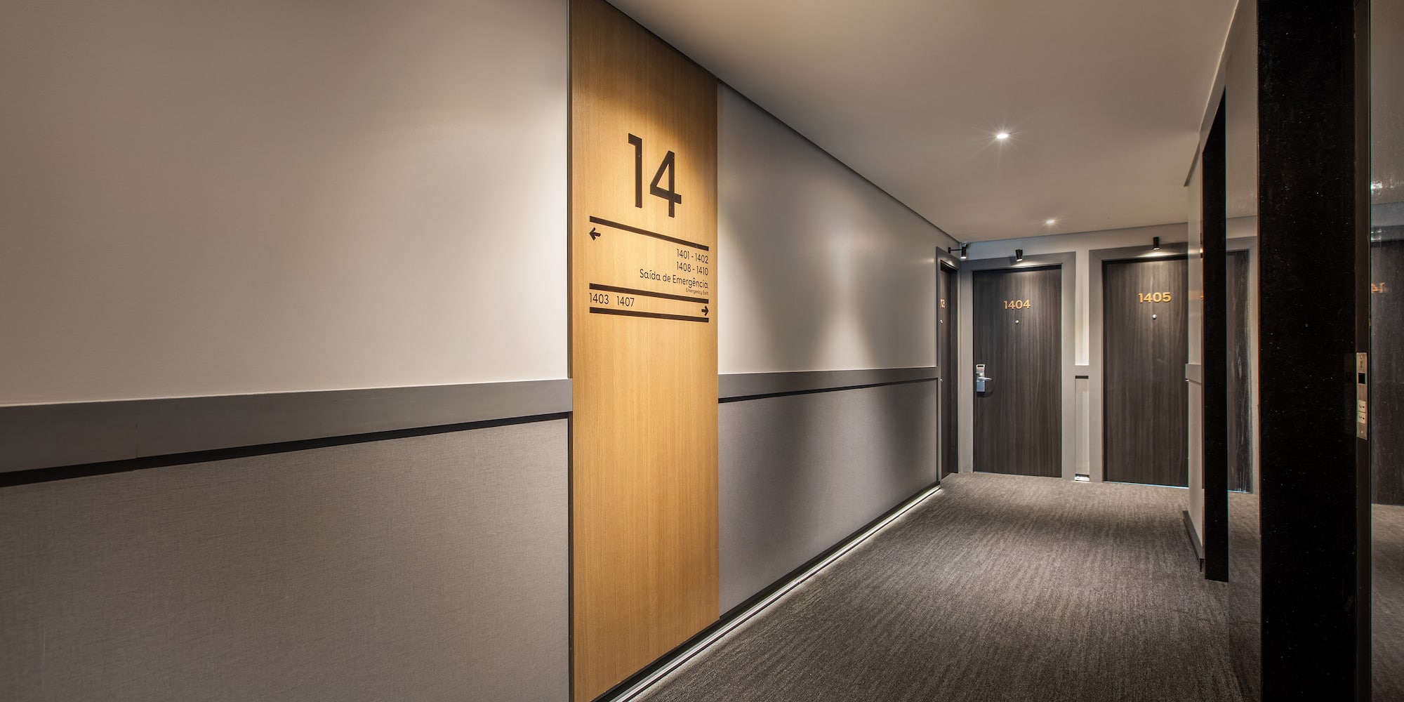 a hallway with two doors