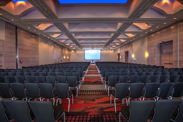 a room with rows of chairs