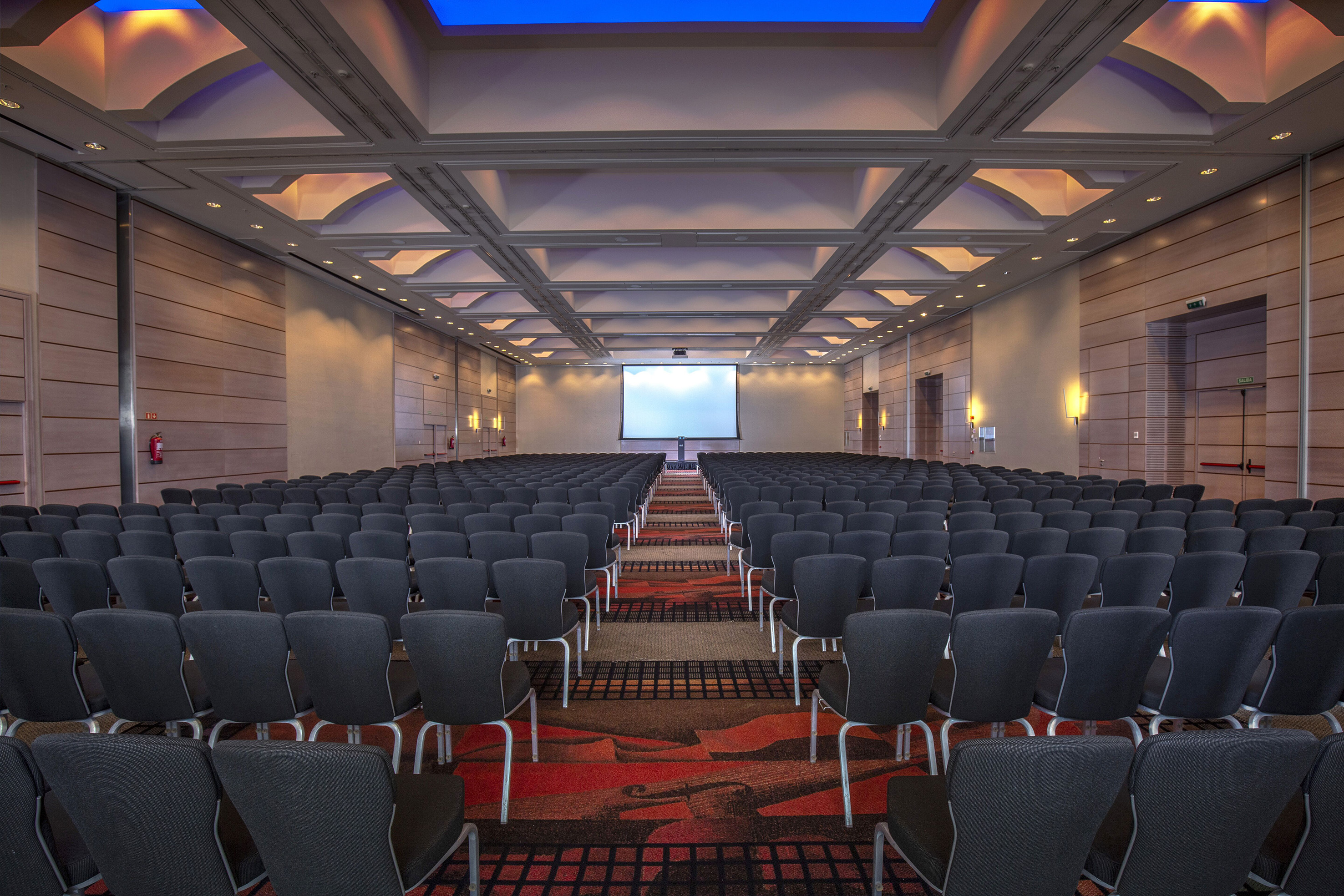 a room with rows of chairs