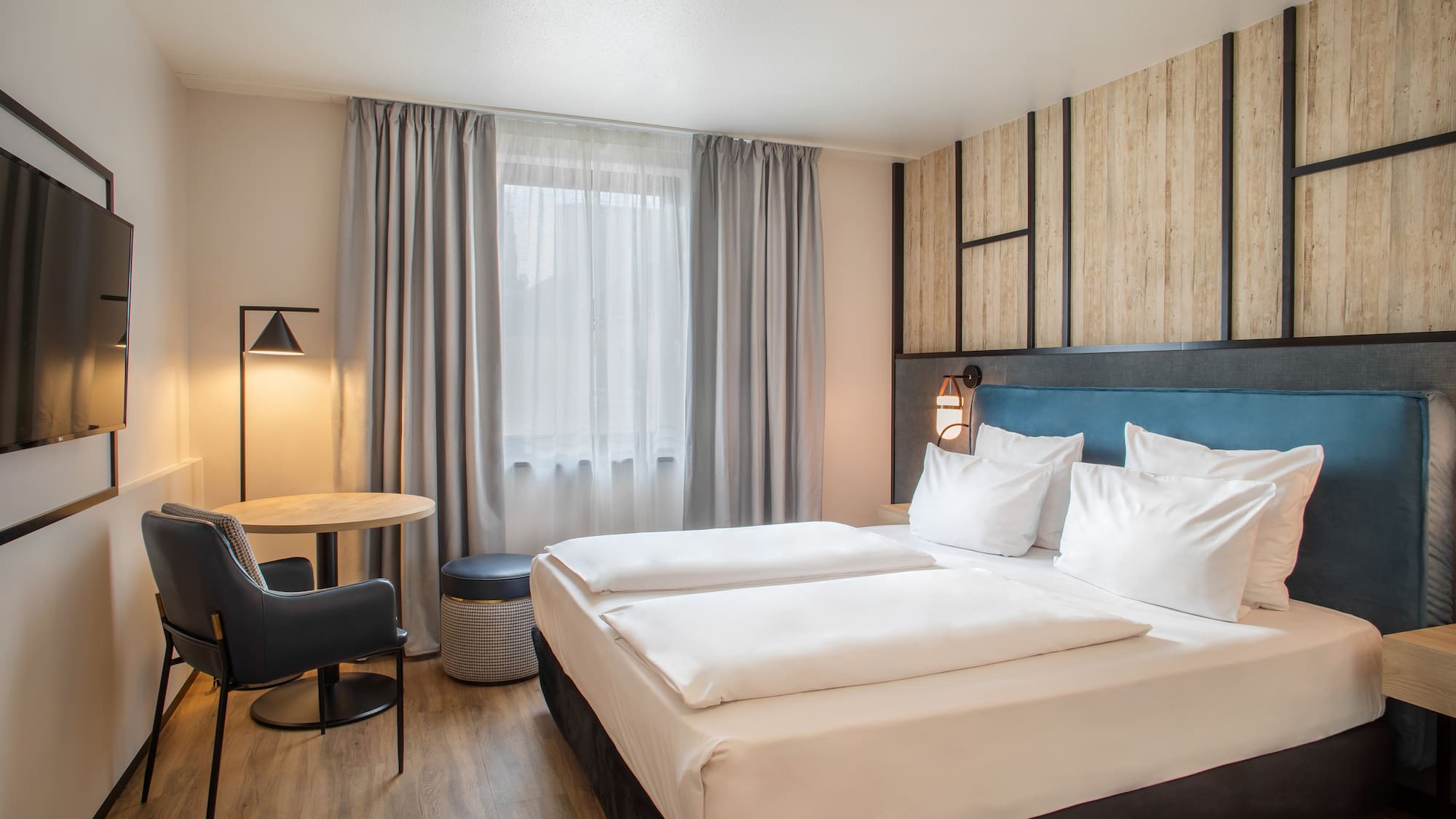 a room with a bed and a table