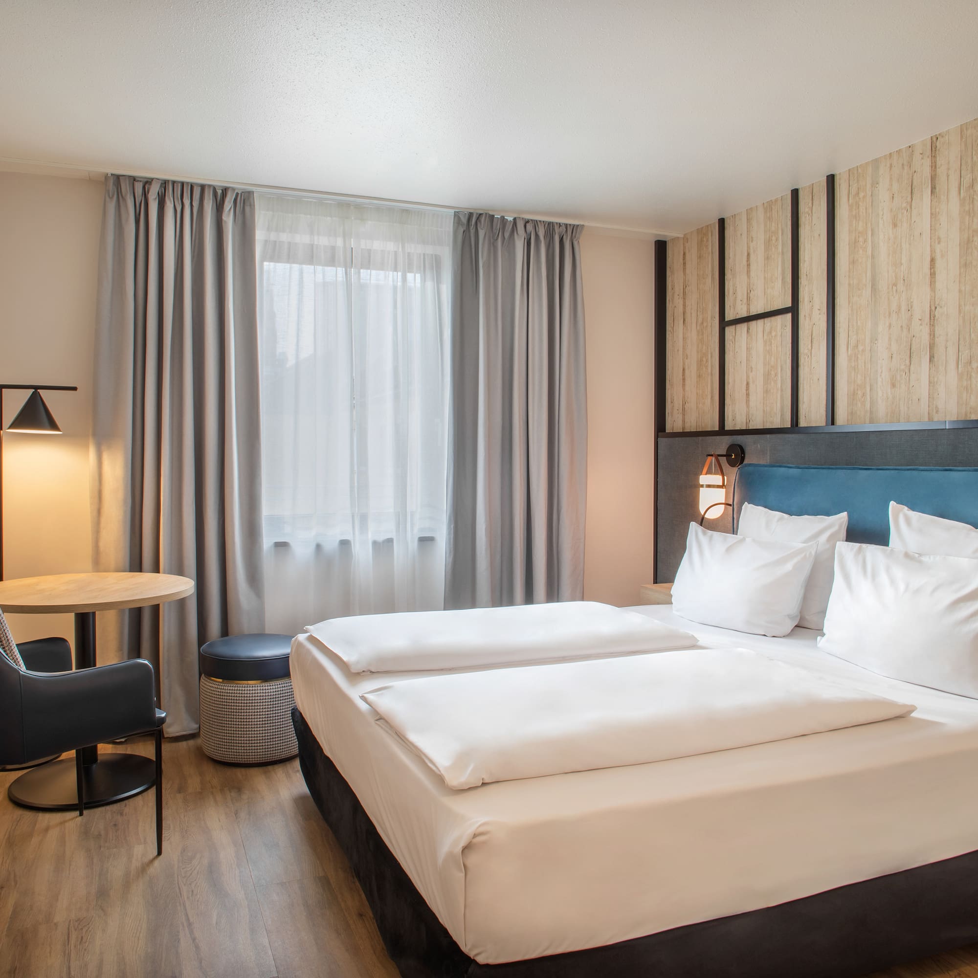 a room with a bed and a table