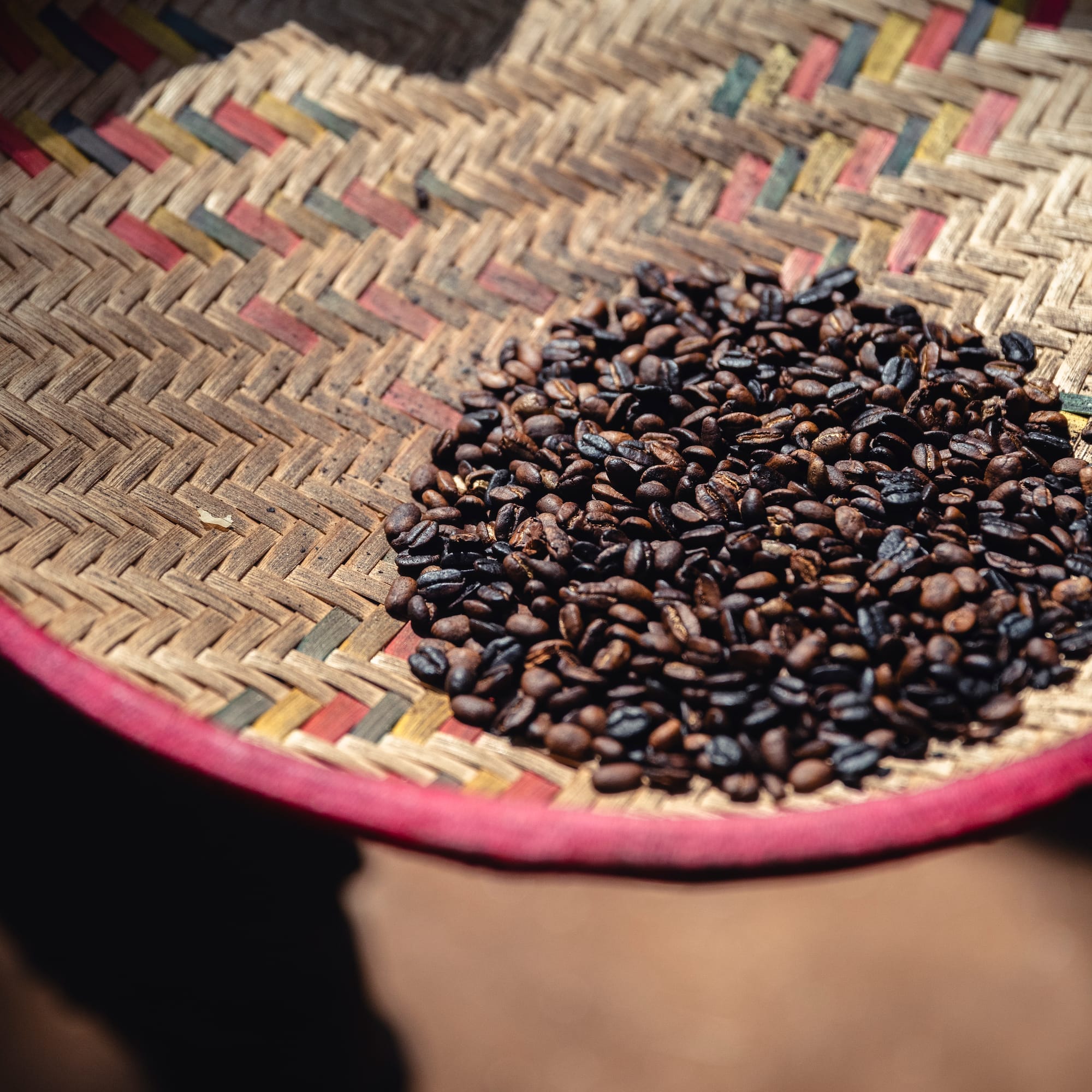 a basket with coffee beans on it