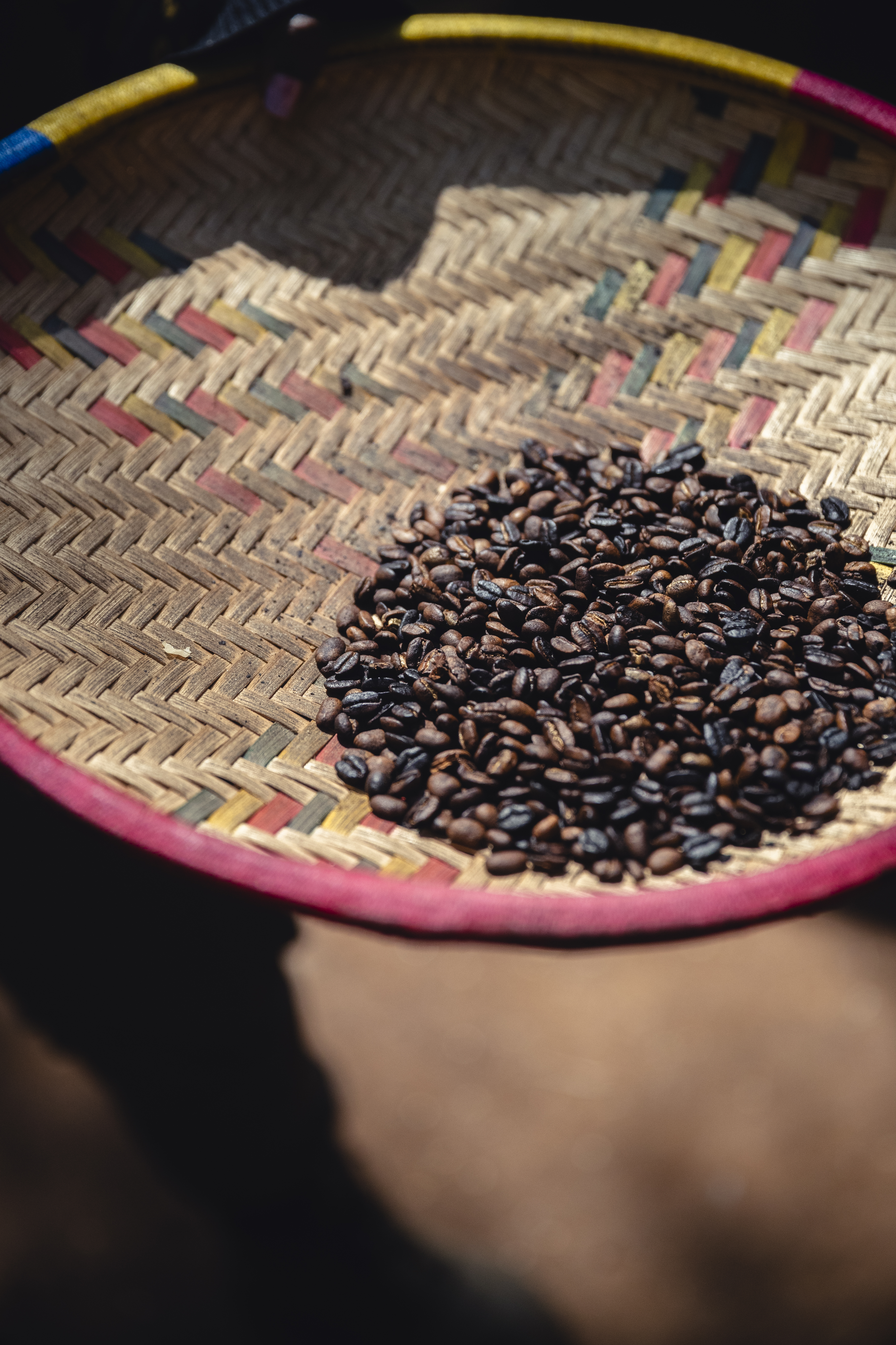 a basket with coffee beans on it