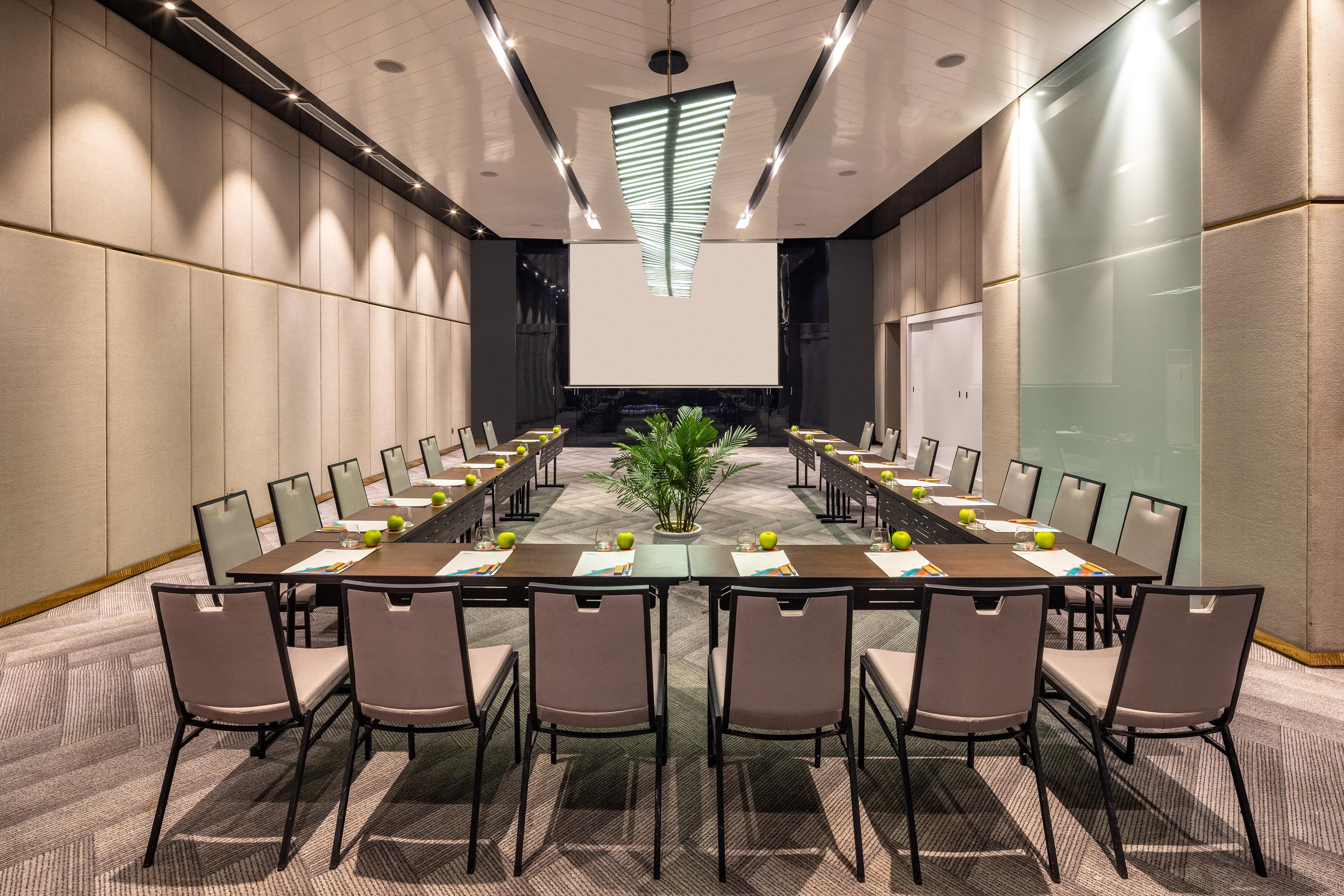 a room with a large table and chairs