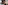 Hotel room with balcony sea view, bed, hat, and Crete travel guides.