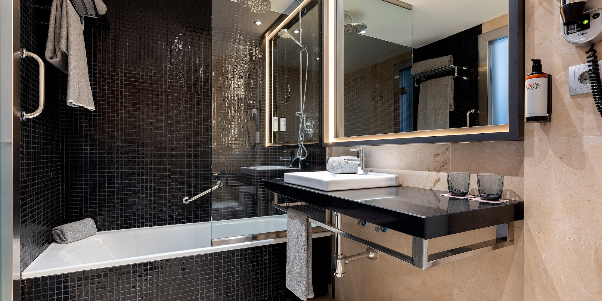 a bathroom with a sink and a bathtub