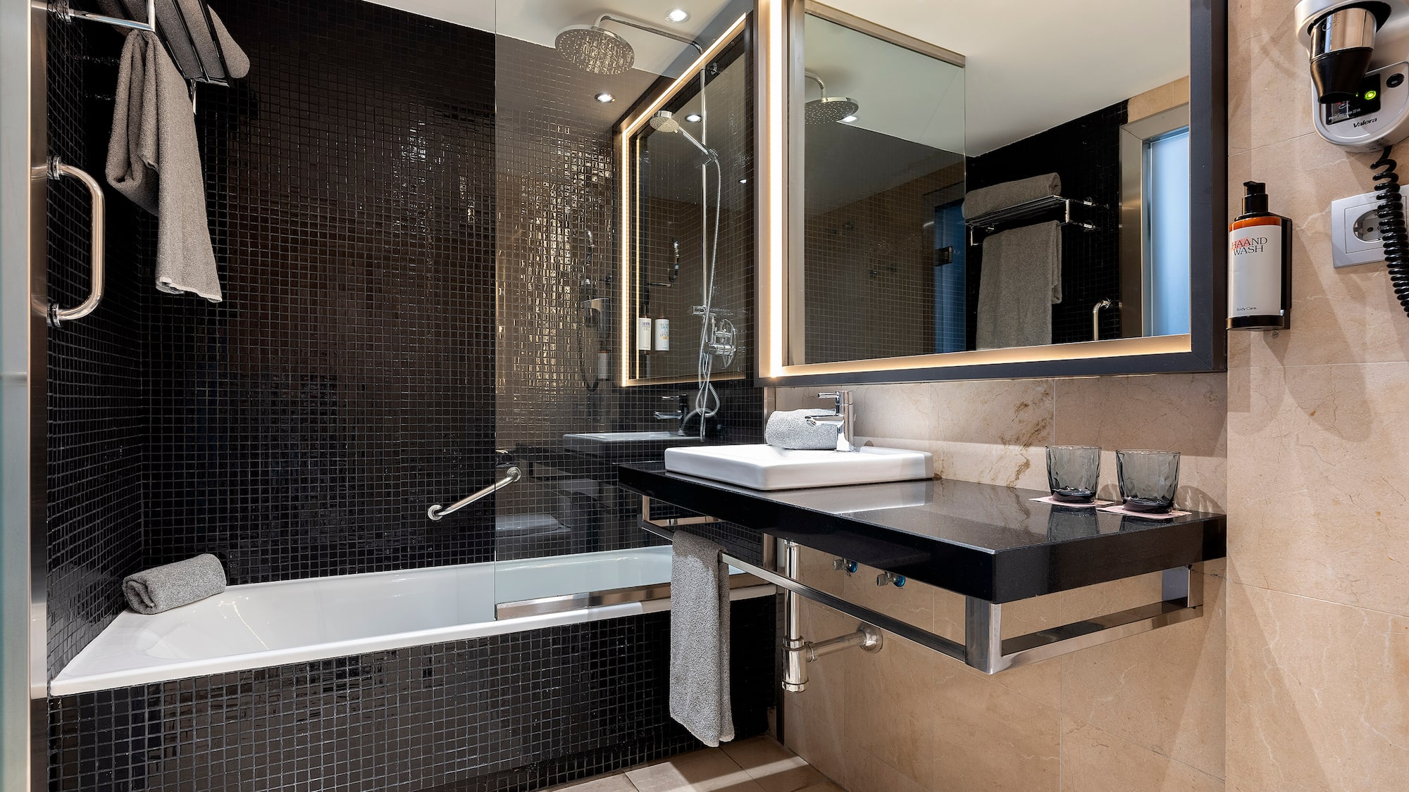 a bathroom with a sink and a bathtub
